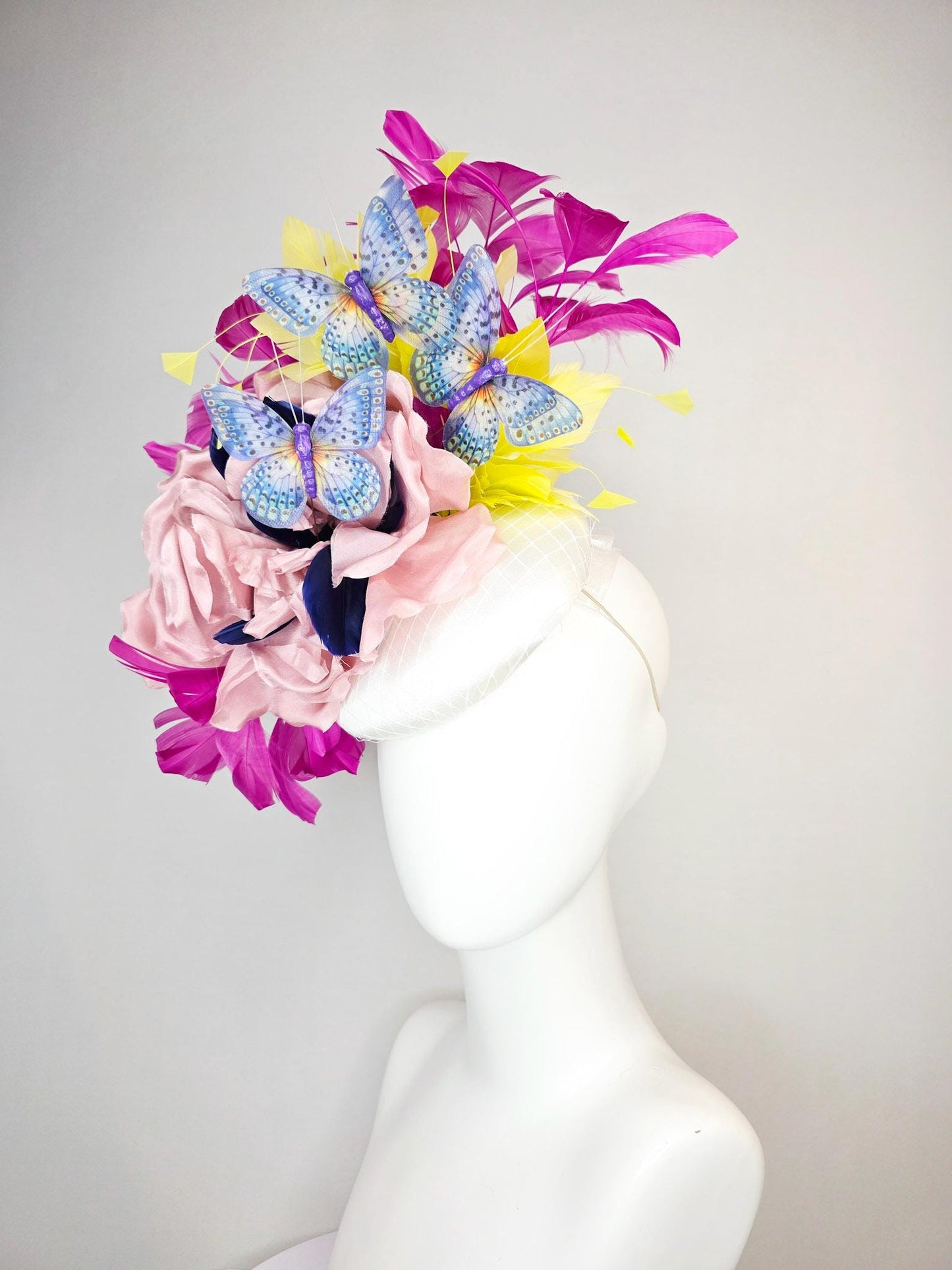 kentucky derby hat fascinator white silk with netting light pink silk roses yellow and magenta purple feathers and purple blue butterflies