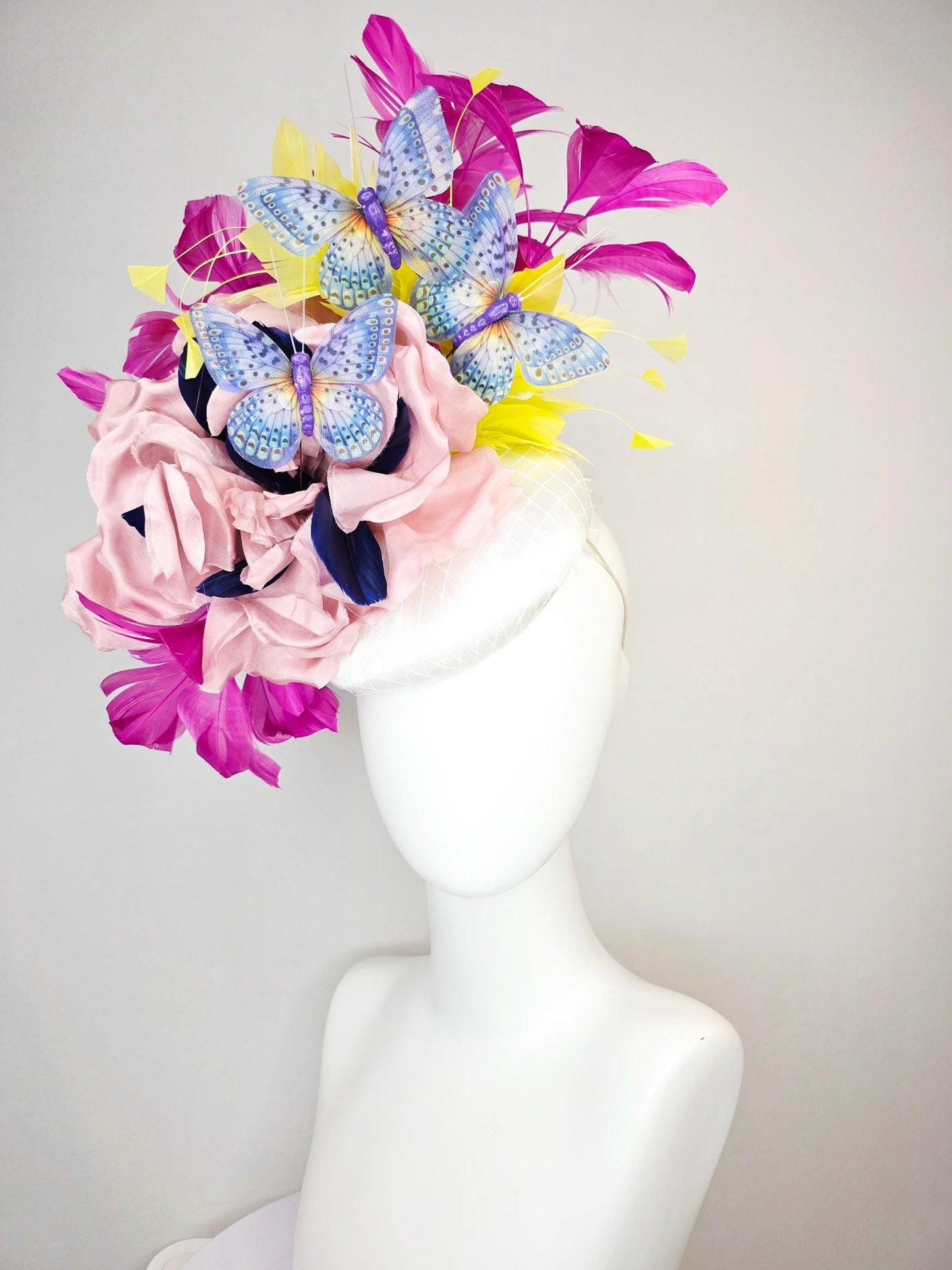 kentucky derby hat fascinator white silk with netting light pink silk roses yellow and magenta purple feathers and purple blue butterflies