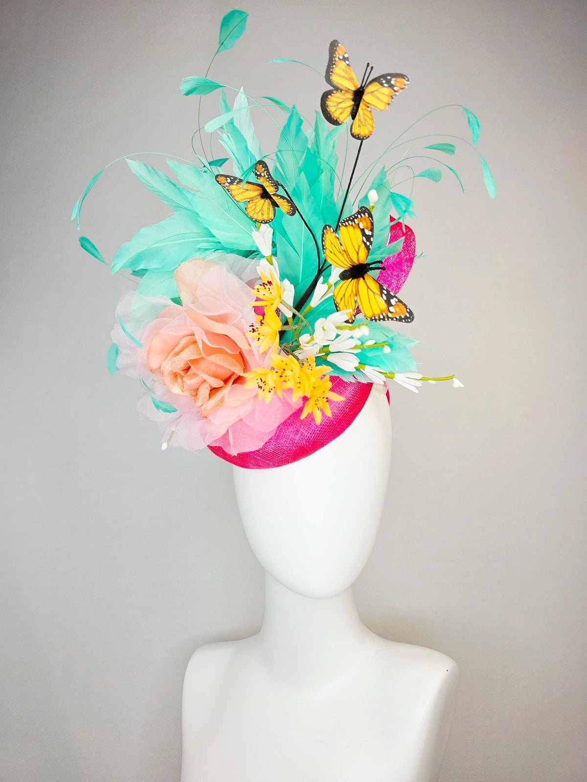 kentucky derby hat fascinator hot pink sinamay with peach organza rose yellow and white flowers green mint feathers and yellow butterflies