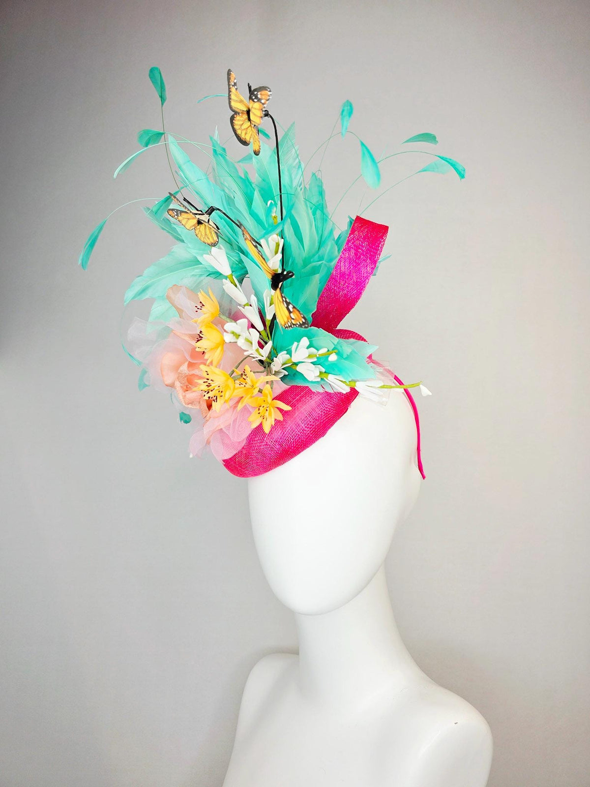 kentucky derby hat fascinator hot pink sinamay with peach organza rose yellow and white flowers green mint feathers and yellow butterflies