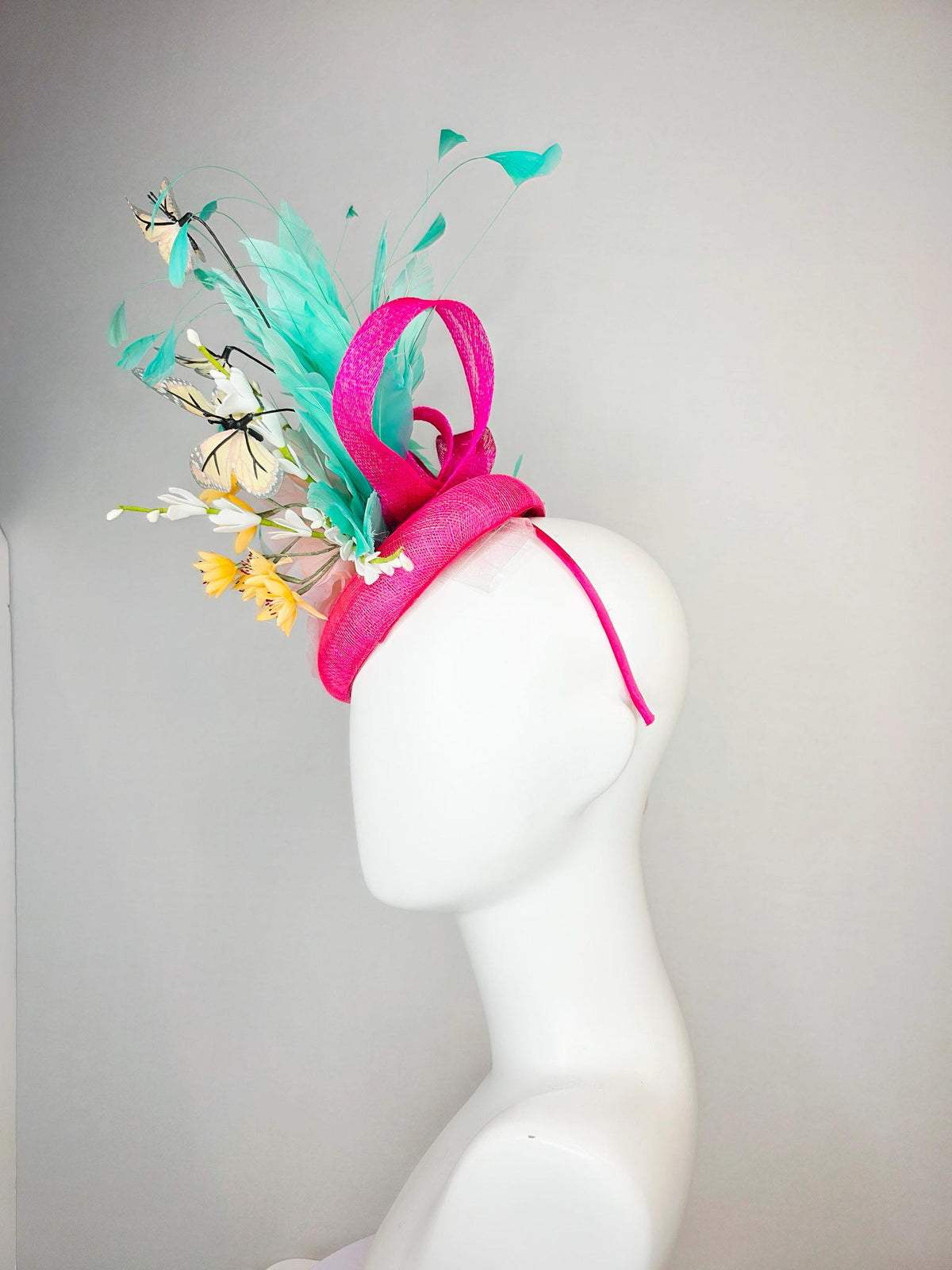 kentucky derby hat fascinator hot pink sinamay with peach organza rose yellow and white flowers green mint feathers and yellow butterflies