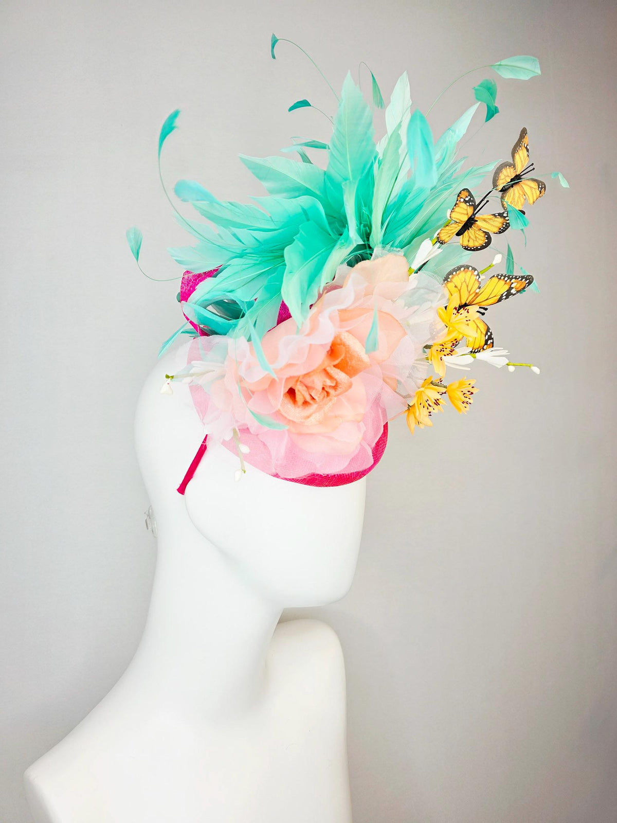 kentucky derby hat fascinator hot pink sinamay with peach organza rose yellow and white flowers green mint feathers and yellow butterflies