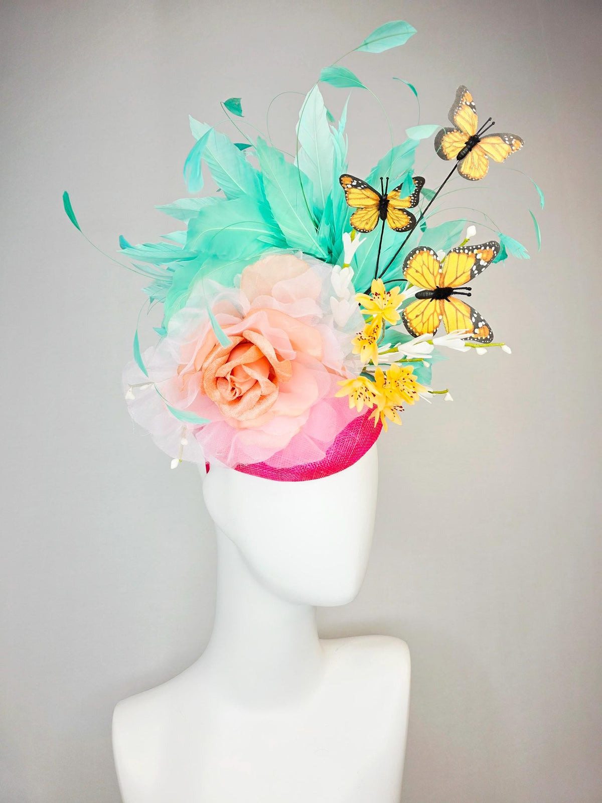 kentucky derby hat fascinator hot pink sinamay with peach organza rose yellow and white flowers green mint feathers and yellow butterflies