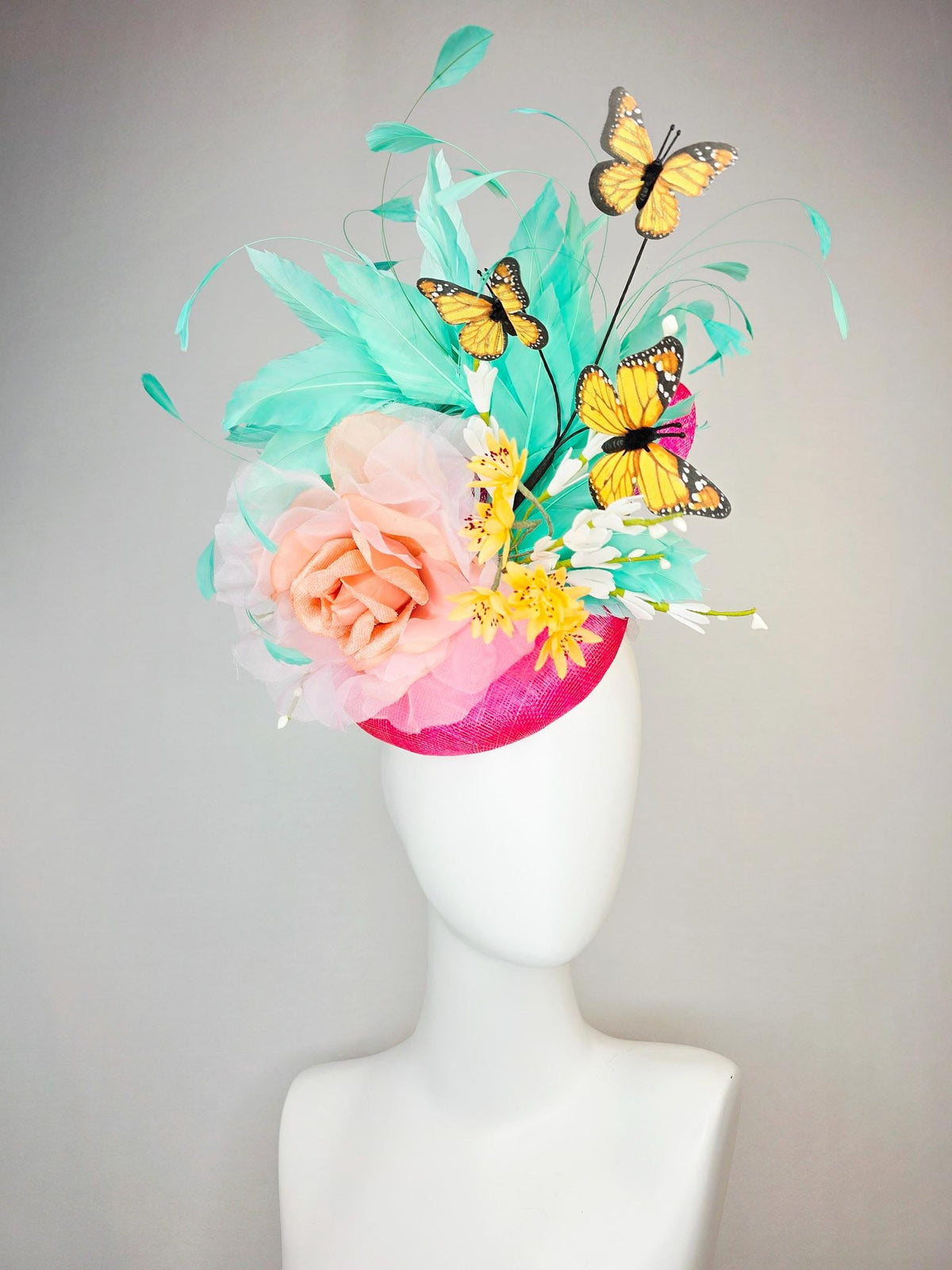 kentucky derby hat fascinator hot pink sinamay with peach organza rose yellow and white flowers green mint feathers and yellow butterflies