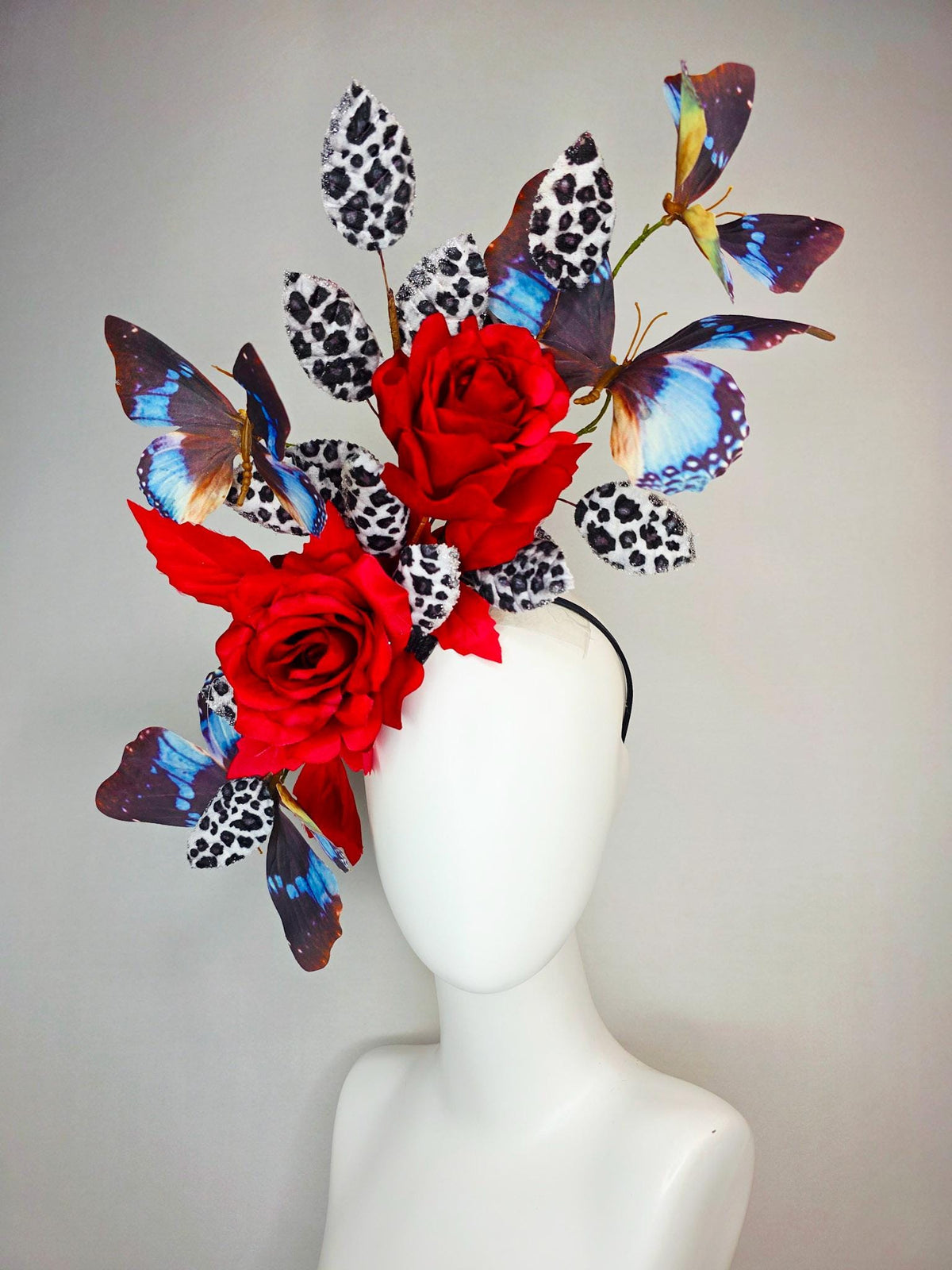 kentucky derby hat fascinator large scarlet red satin roses gray black and white leopard print velvet leaves sky blue and black butterflies