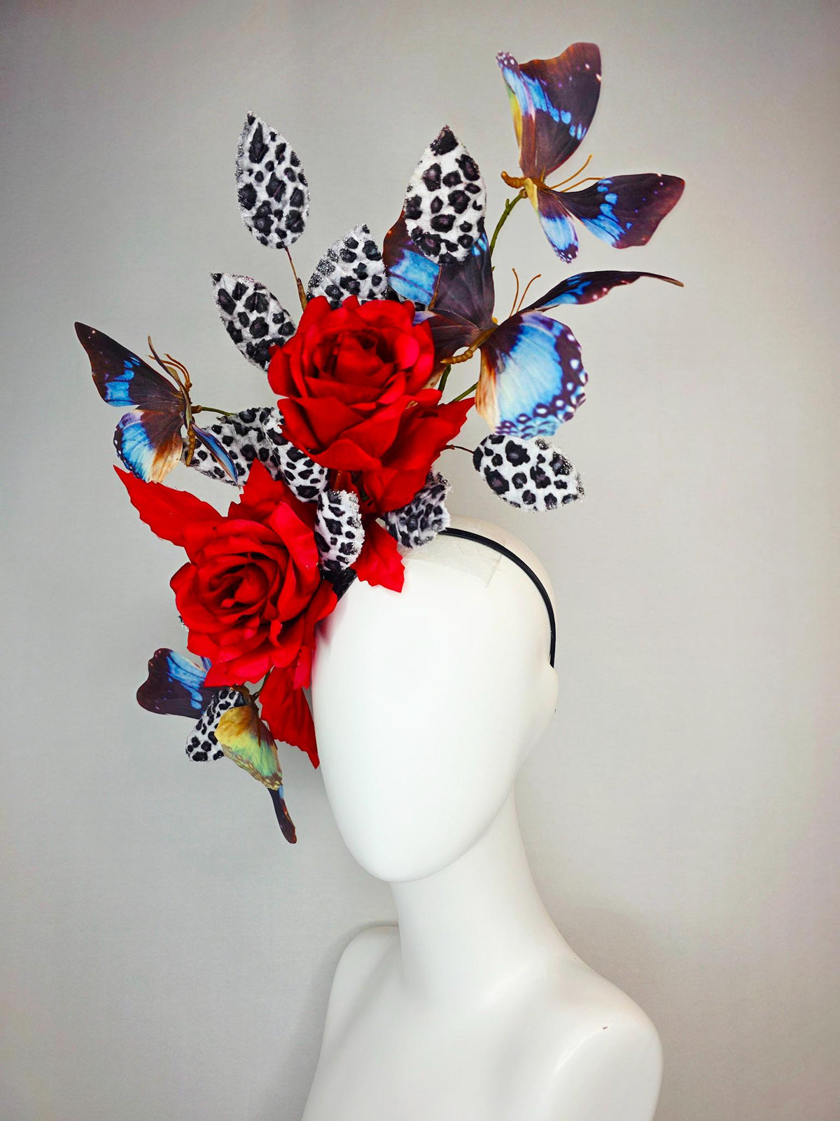 kentucky derby hat fascinator large scarlet red satin roses gray black and white leopard print velvet leaves sky blue and black butterflies