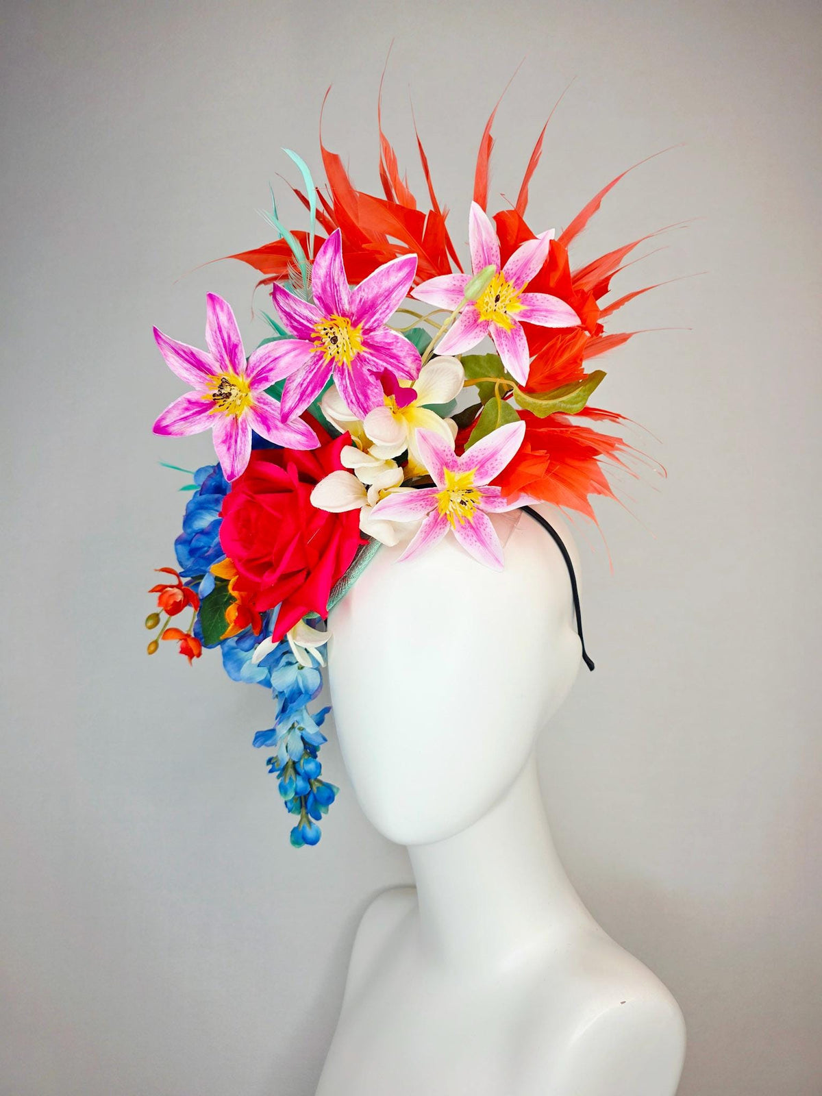 kentucky derby hat fascinator red satin rose orange ivory white pink blue satin flowers green leaves coral red and aqua mint green feathers