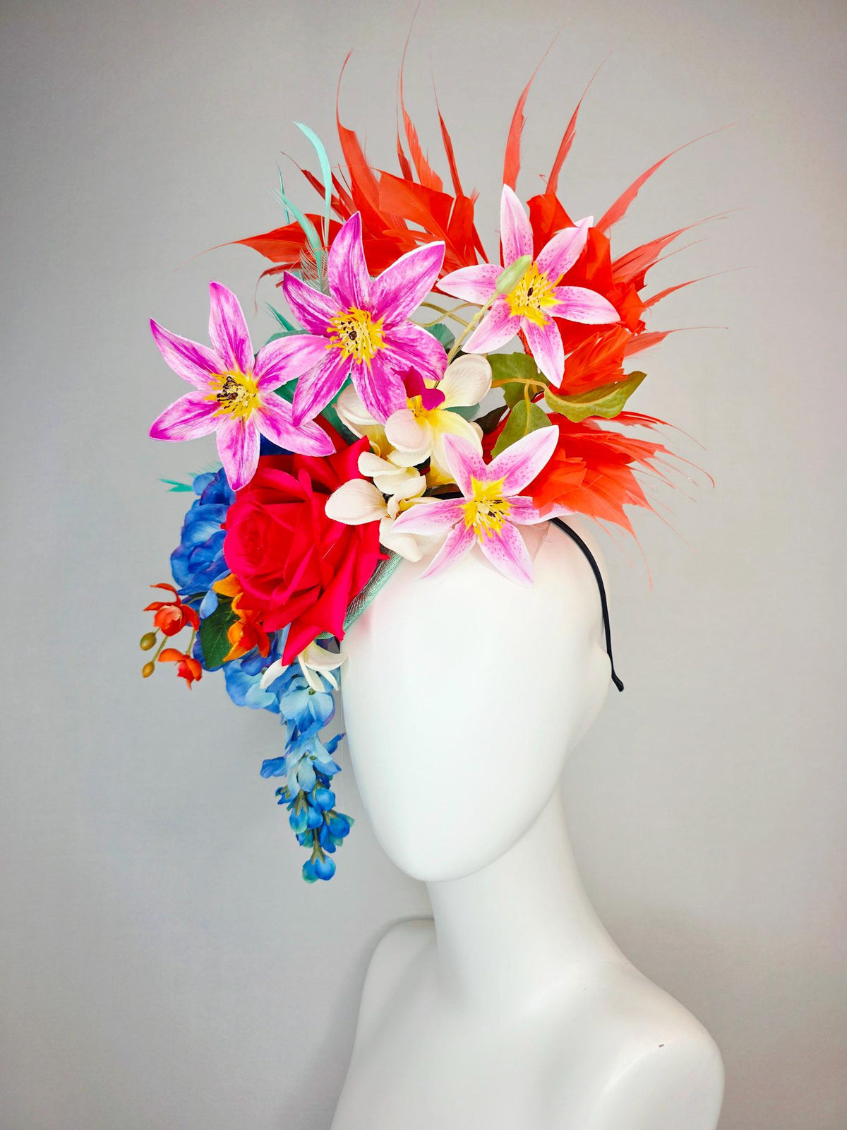 kentucky derby hat fascinator red satin rose orange ivory white pink blue satin flowers green leaves coral red and aqua mint green feathers