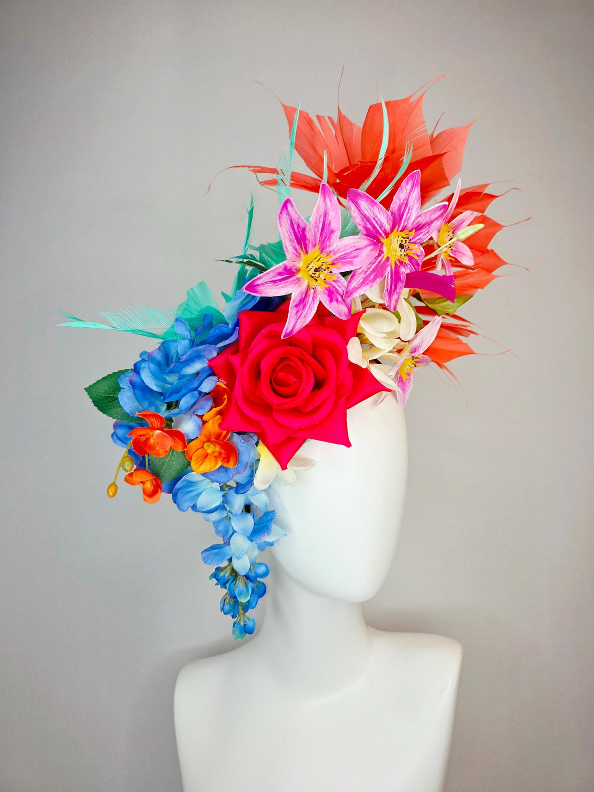 kentucky derby hat fascinator red satin rose orange ivory white pink blue satin flowers green leaves coral red and aqua mint green feathers