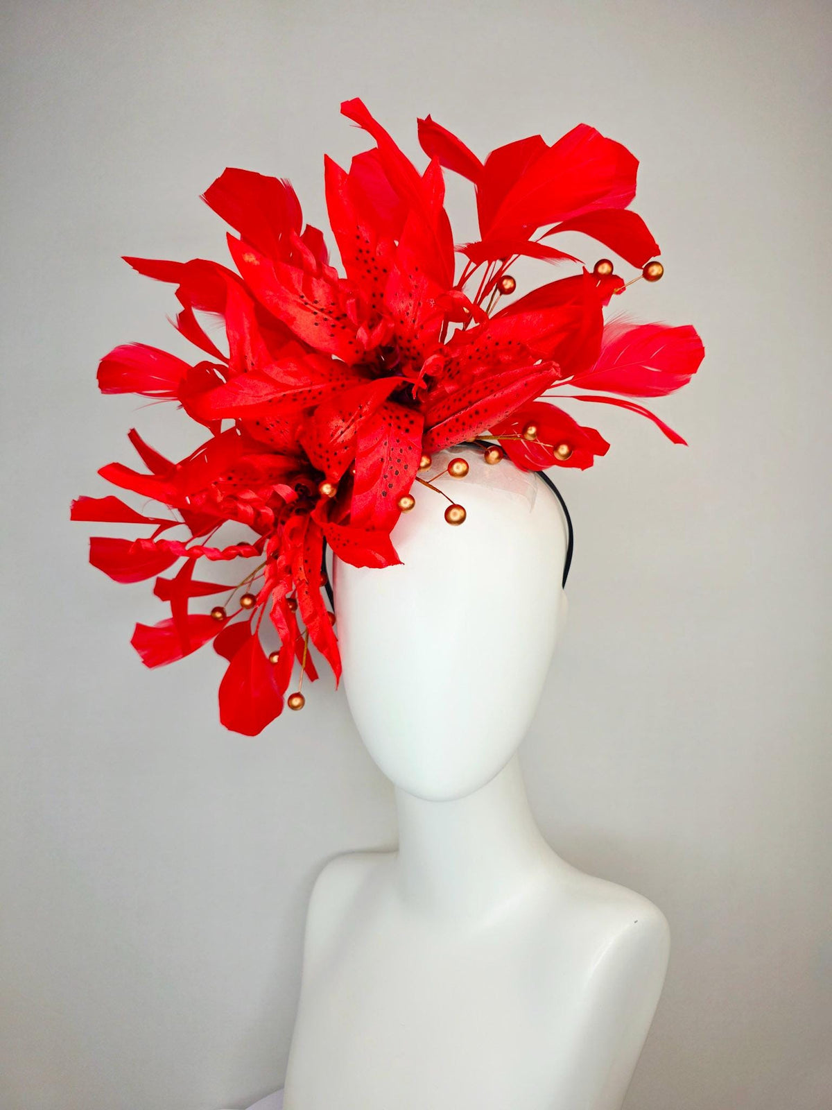 kentucky derby hat fascinator bright scarlet red satin lily flowers with gold pearls and bright red branching feathers
