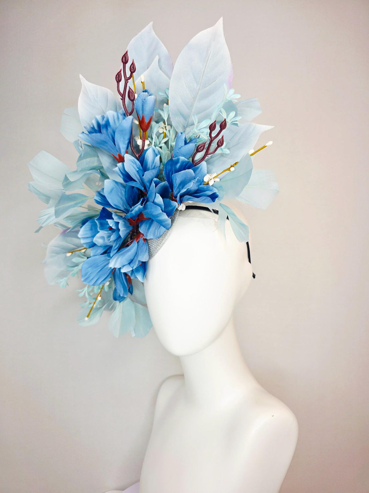 kentucky derby hat fascinator ombre royal blue satin flowers baby blue flower stems light blue satin leaves light blue branching feathers