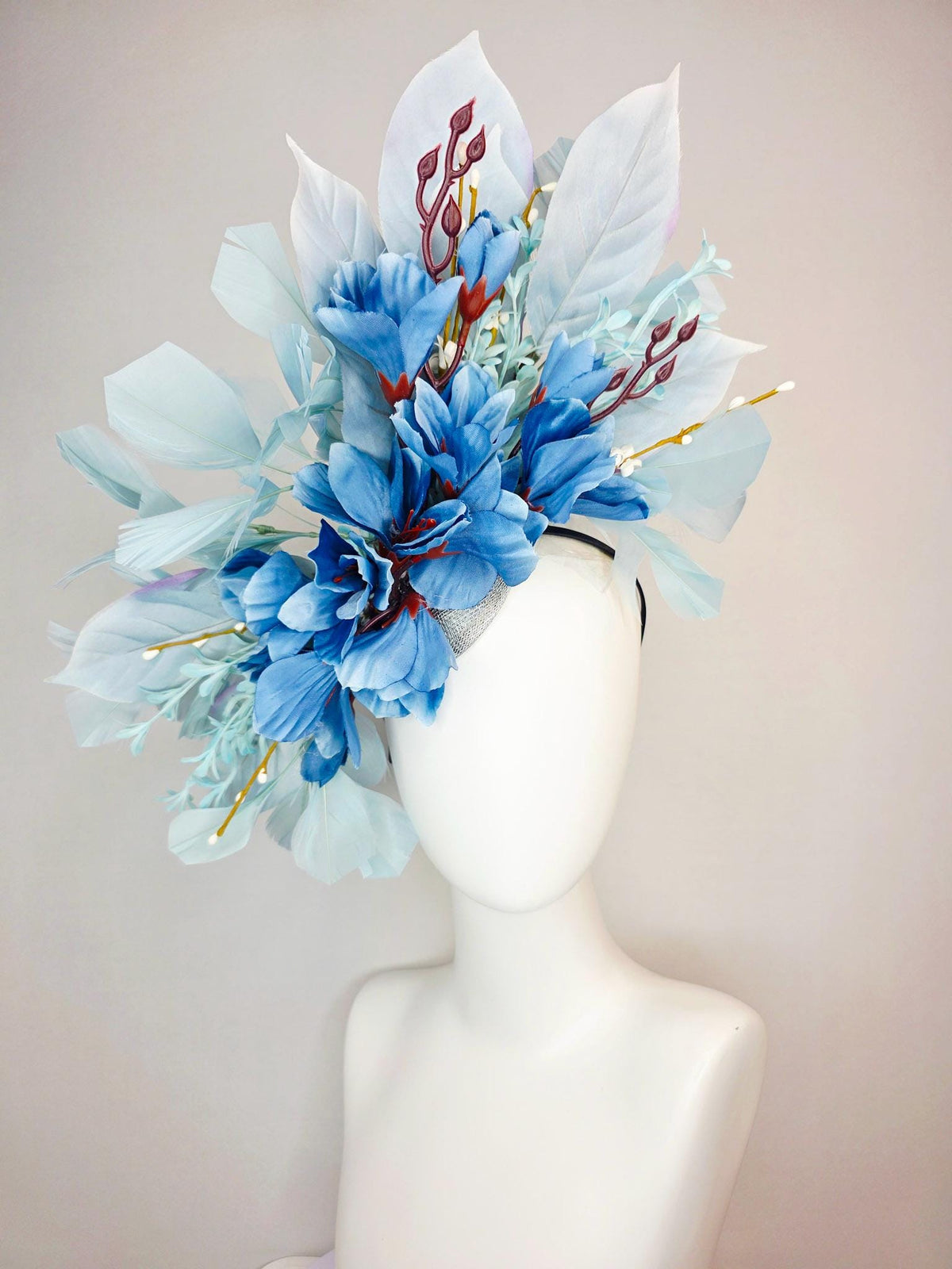 kentucky derby hat fascinator ombre royal blue satin flowers baby blue flower stems light blue satin leaves light blue branching feathers