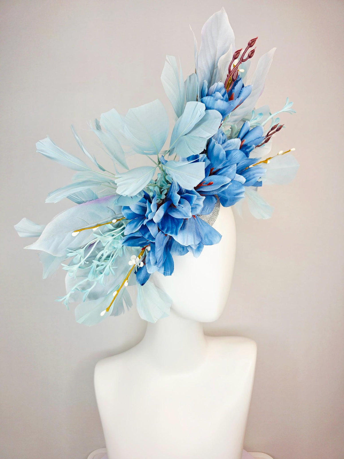 kentucky derby hat fascinator ombre royal blue satin flowers baby blue flower stems light blue satin leaves light blue branching feathers