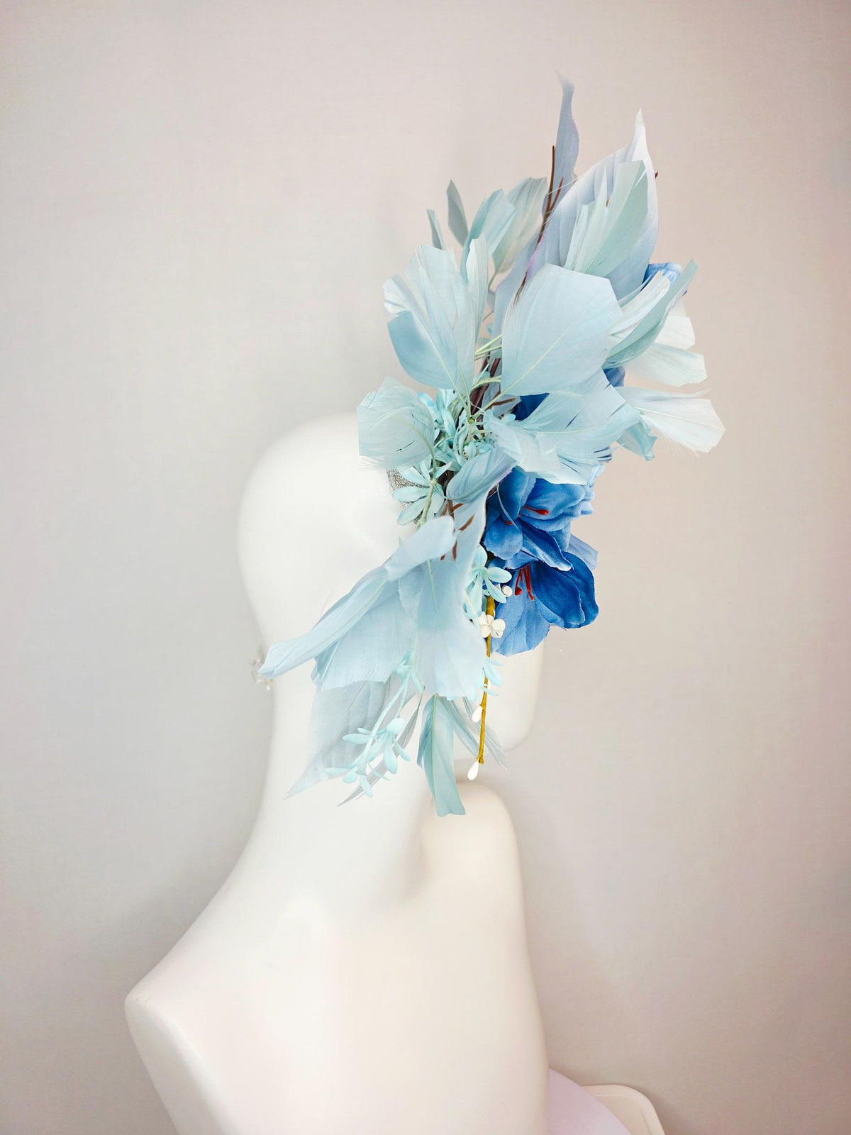 kentucky derby hat fascinator ombre royal blue satin flowers baby blue flower stems light blue satin leaves light blue branching feathers
