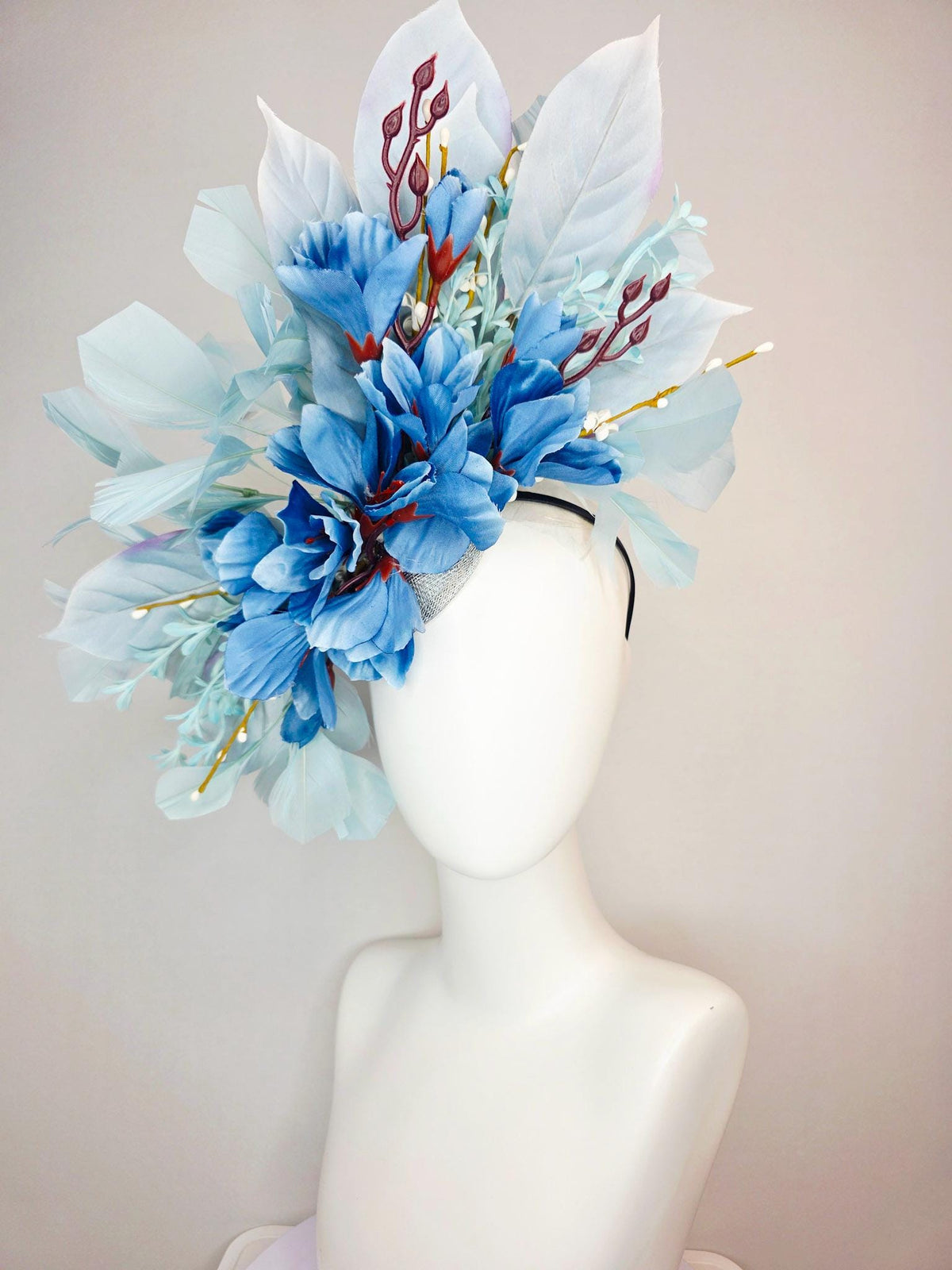 kentucky derby hat fascinator ombre royal blue satin flowers baby blue flower stems light blue satin leaves light blue branching feathers