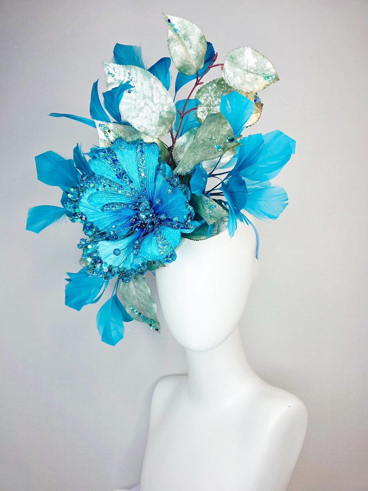 kentucky derby hat fascinator large with sky ocean blue satin flower with sequin silver sage green leaves turquoise blue branching feathers
