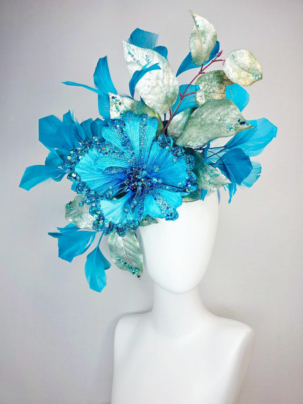 kentucky derby hat fascinator large with sky ocean blue satin flower with sequin silver sage green leaves turquoise blue branching feathers