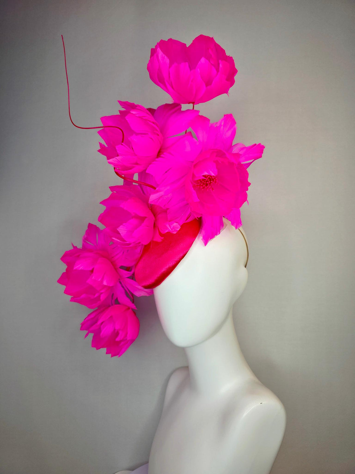 kentucky derby hat fascinator red satin with large fluffy bright fuchsia pink feather flowers and fuchsia pink feathers