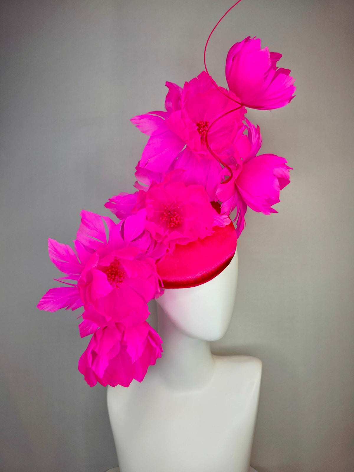 kentucky derby hat fascinator red satin with large fluffy bright fuchsia pink feather flowers and fuchsia pink feathers