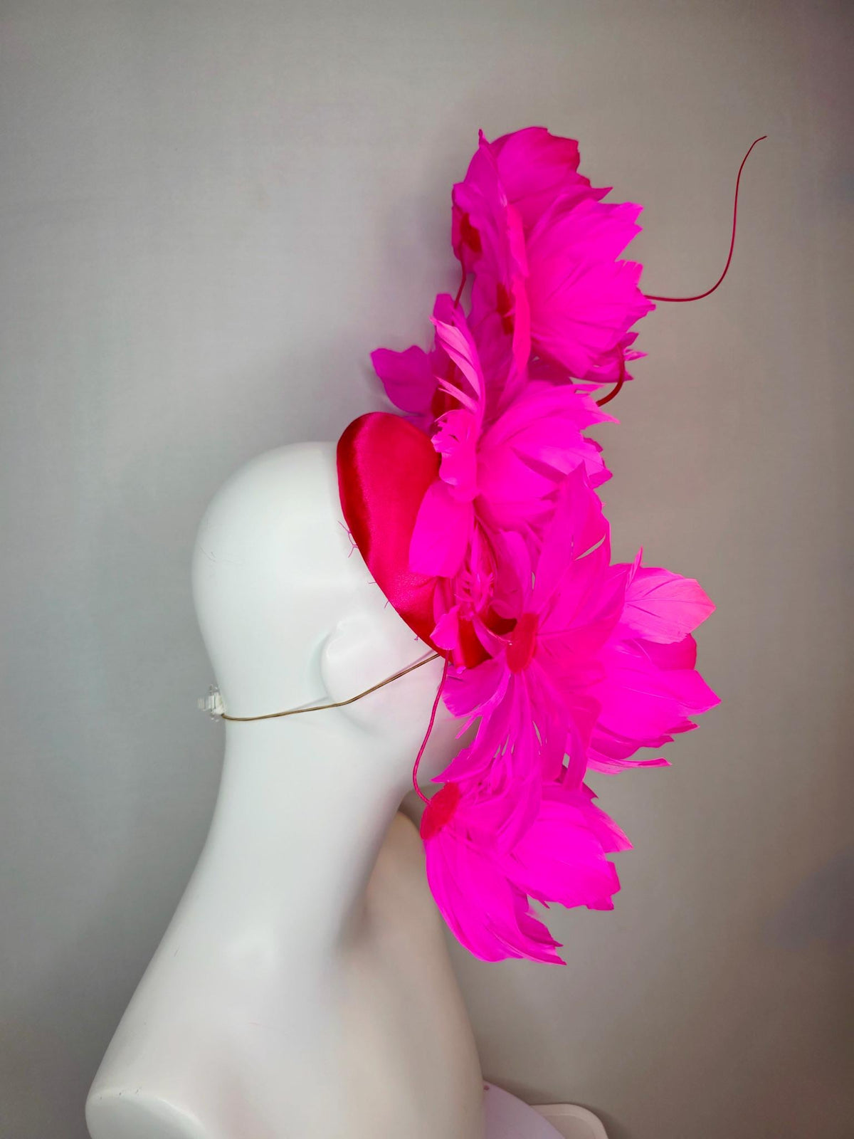 kentucky derby hat fascinator red satin with large fluffy bright fuchsia pink feather flowers and fuchsia pink feathers