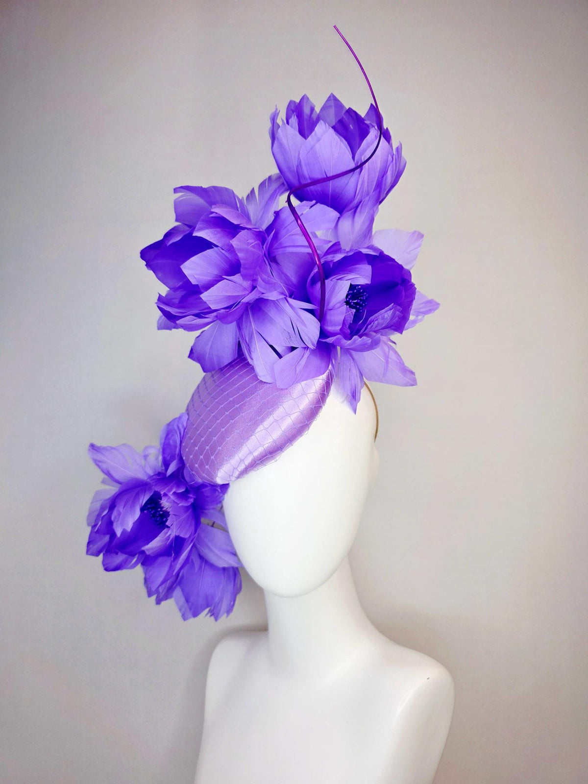 kentucky derby hat fascinator lavender purple satin with netting and large fluffy violet purple feather flowers and light purple feathers