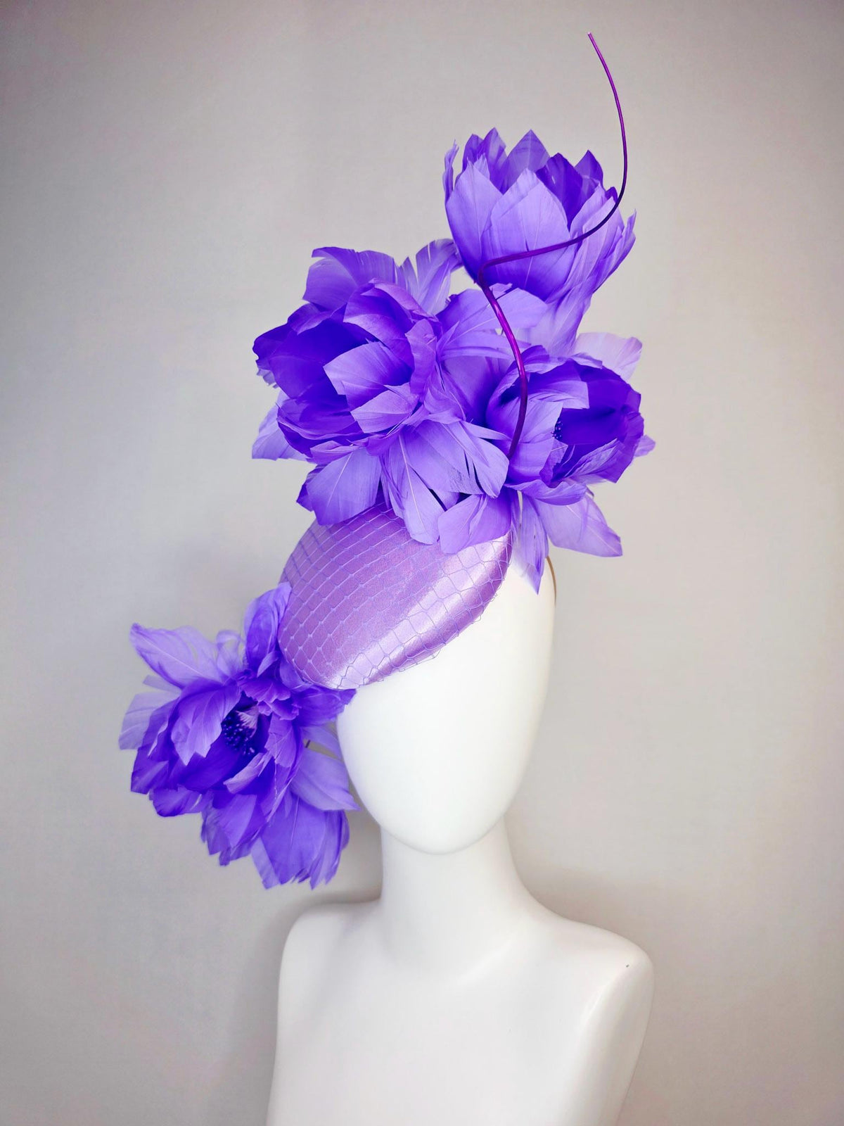 kentucky derby hat fascinator lavender purple satin with netting and large fluffy violet purple feather flowers and light purple feathers