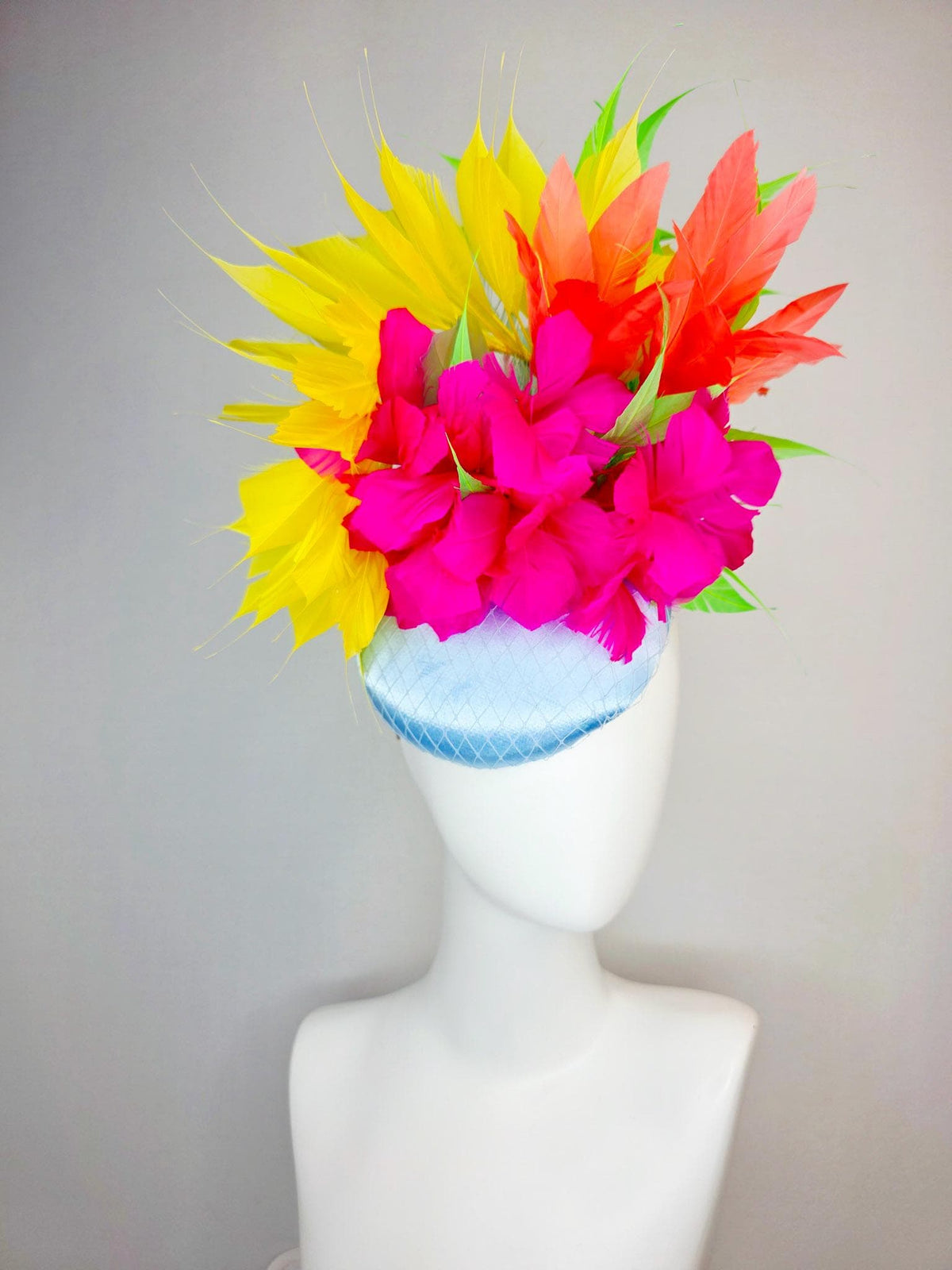 kentucky derby hat fascinator light blue satin with netting fuchsia pink fluffy feathers and yellow orange lime green branching feathers