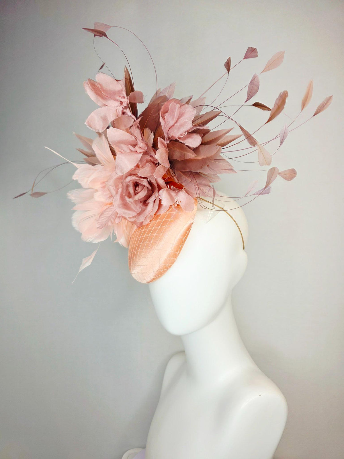 kentucky derby hat fascinator champagne pink peach satin with netting dusty pink organza roses baby pink and mauve dusty fluffy feathers