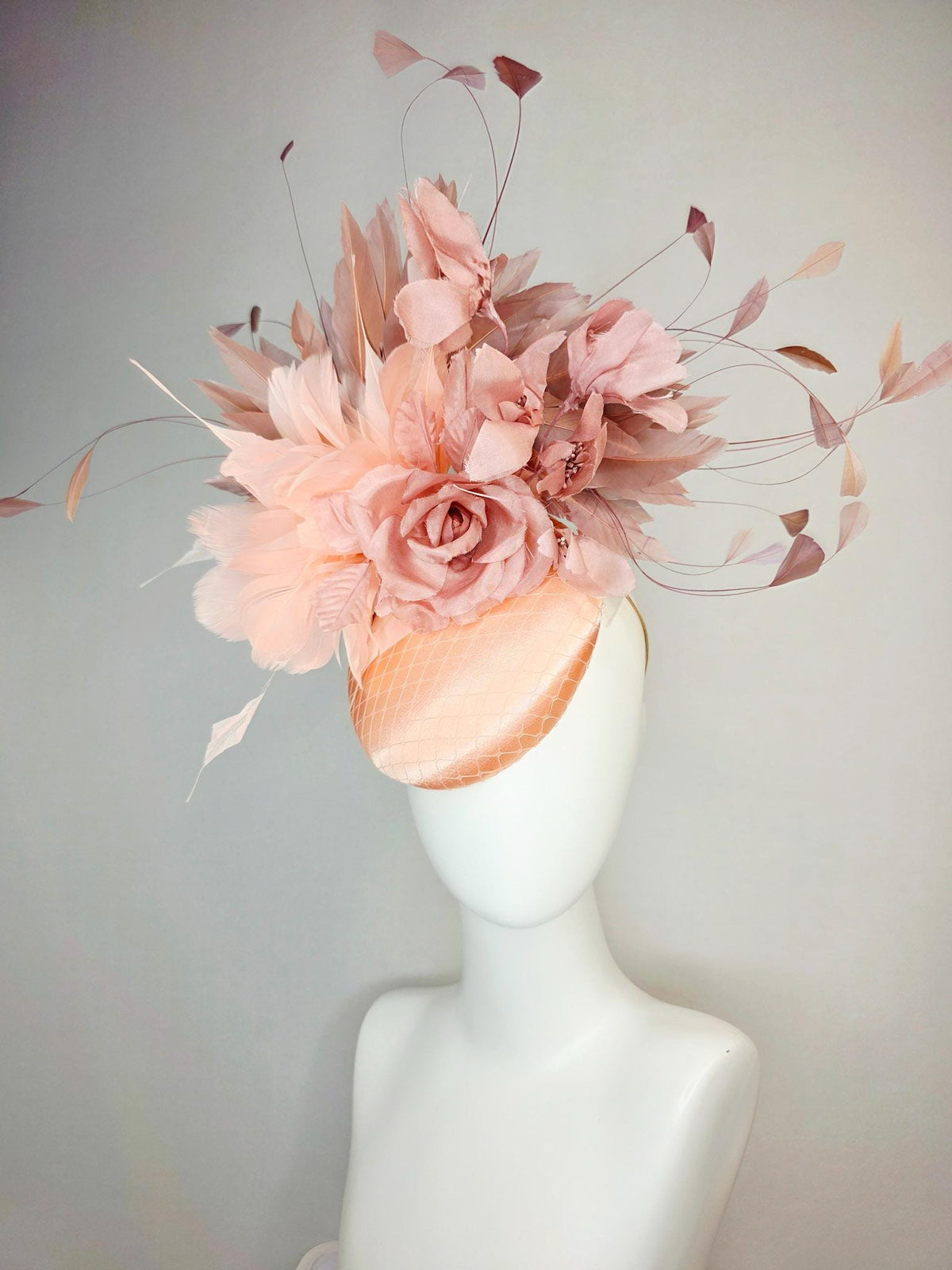 kentucky derby hat fascinator champagne pink peach satin with netting dusty pink organza roses baby pink and mauve dusty fluffy feathers