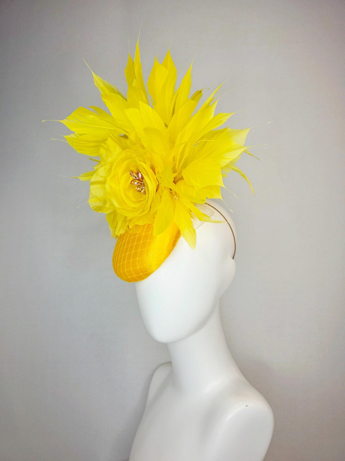 kentucky derby hat fascinator bright yellow satin with netting large yellow organza rose with yellow leaves and yellow branching feathers