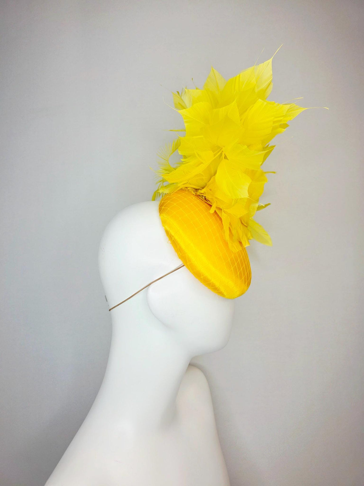 kentucky derby hat fascinator bright yellow satin with netting large yellow organza rose with yellow leaves and yellow branching feathers