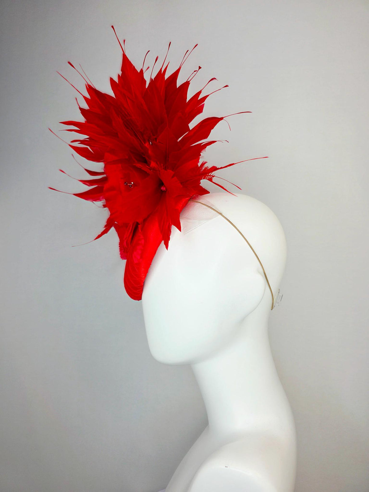 kentucky derby hat fascinator bright red satin with netting large red organza rose flower with red leaves and scarlet red branching feathers