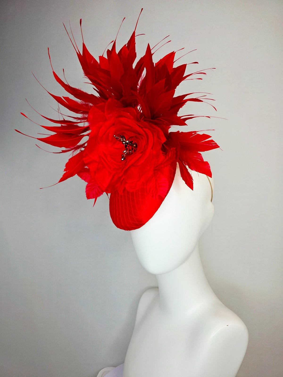 kentucky derby hat fascinator bright red satin with netting large red organza rose flower with red leaves and scarlet red branching feathers