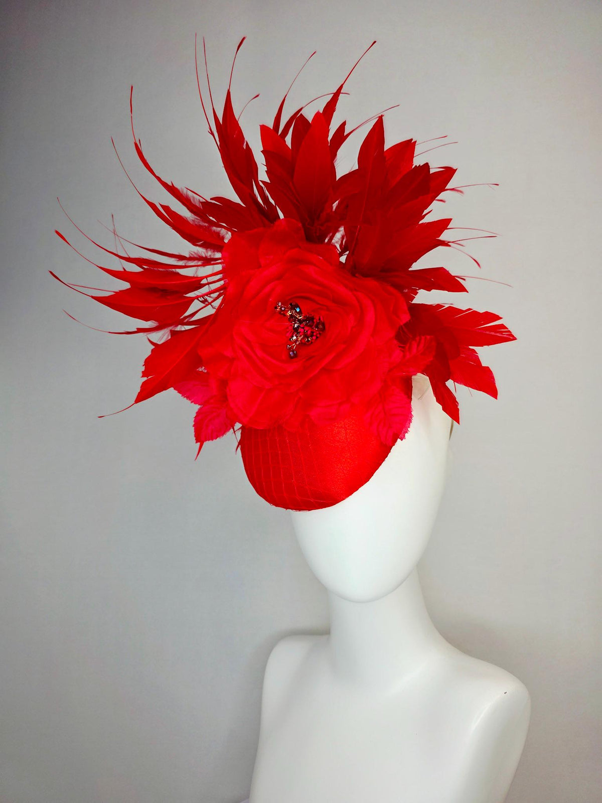kentucky derby hat fascinator bright red satin with netting large red organza rose flower with red leaves and scarlet red branching feathers