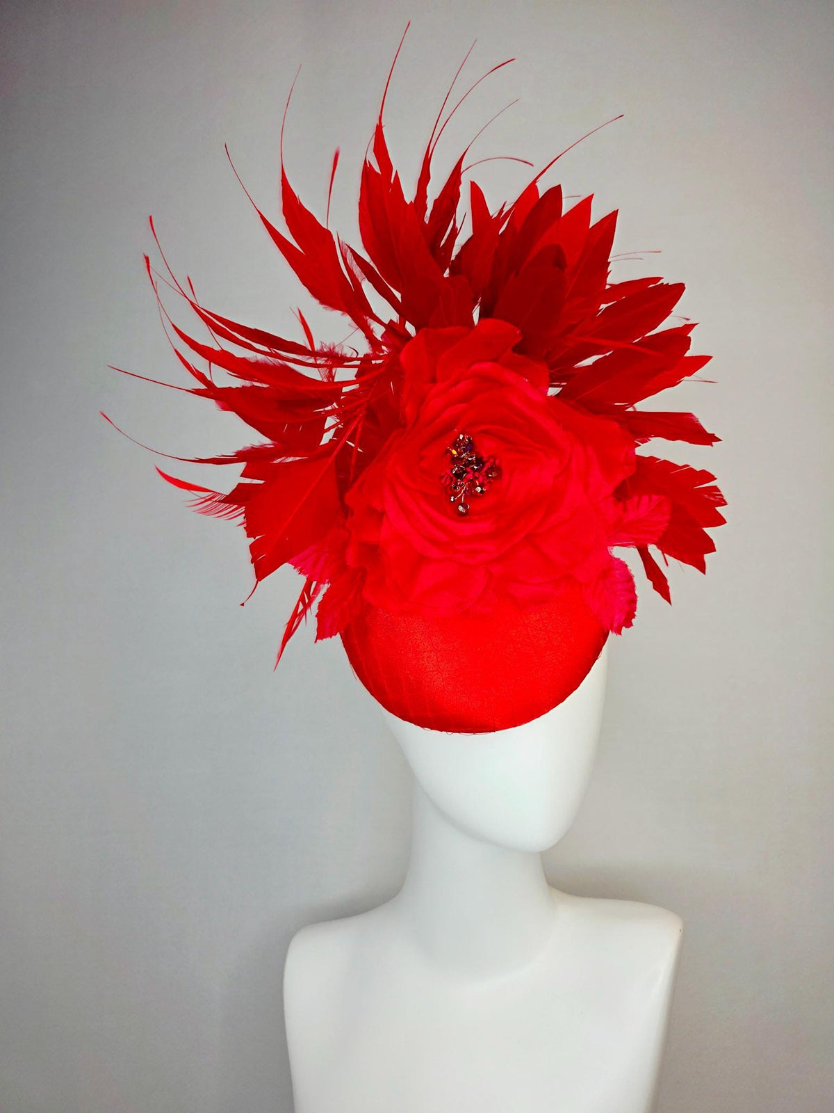 kentucky derby hat fascinator bright red satin with netting large red organza rose flower with red leaves and scarlet red branching feathers