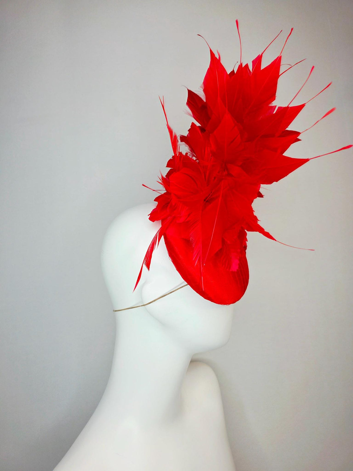 kentucky derby hat fascinator bright red satin with netting large red organza rose flower with red leaves and scarlet red branching feathers