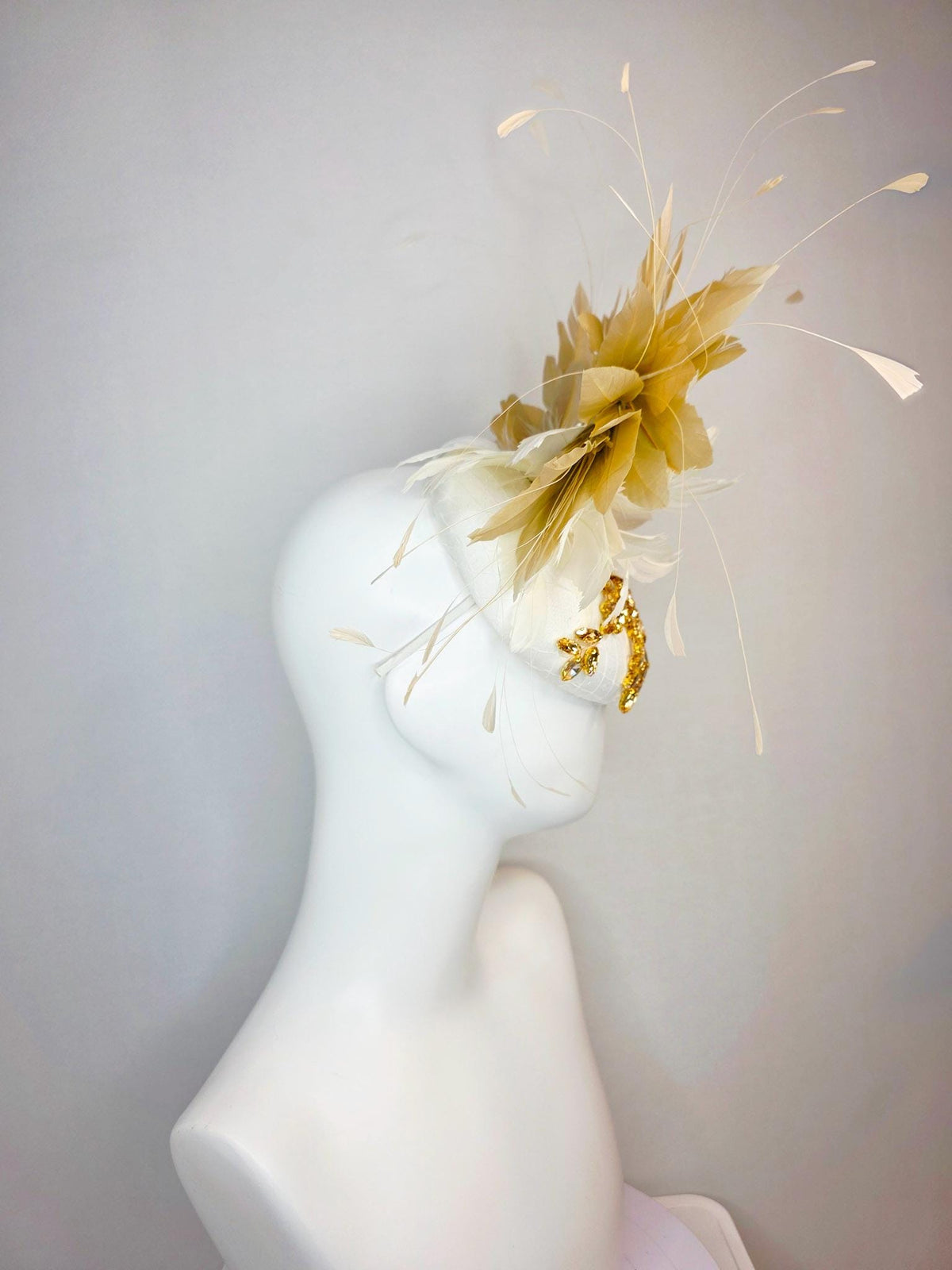 kentucky derby hat fascinator ivory white satin with netting leaf vine gold crystal rhinestone fluffy ivory white tan beige gold feathers