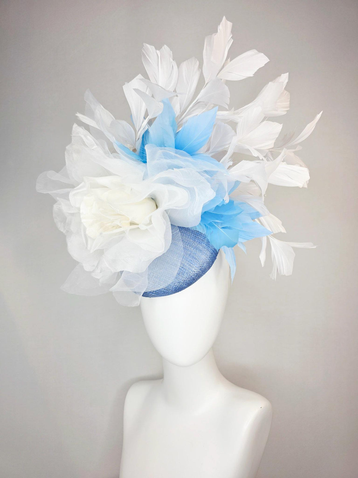 kentucky derby hat fascinator denim blue sinamay with large ivory white organza rose flower sky blue and white branching feathers