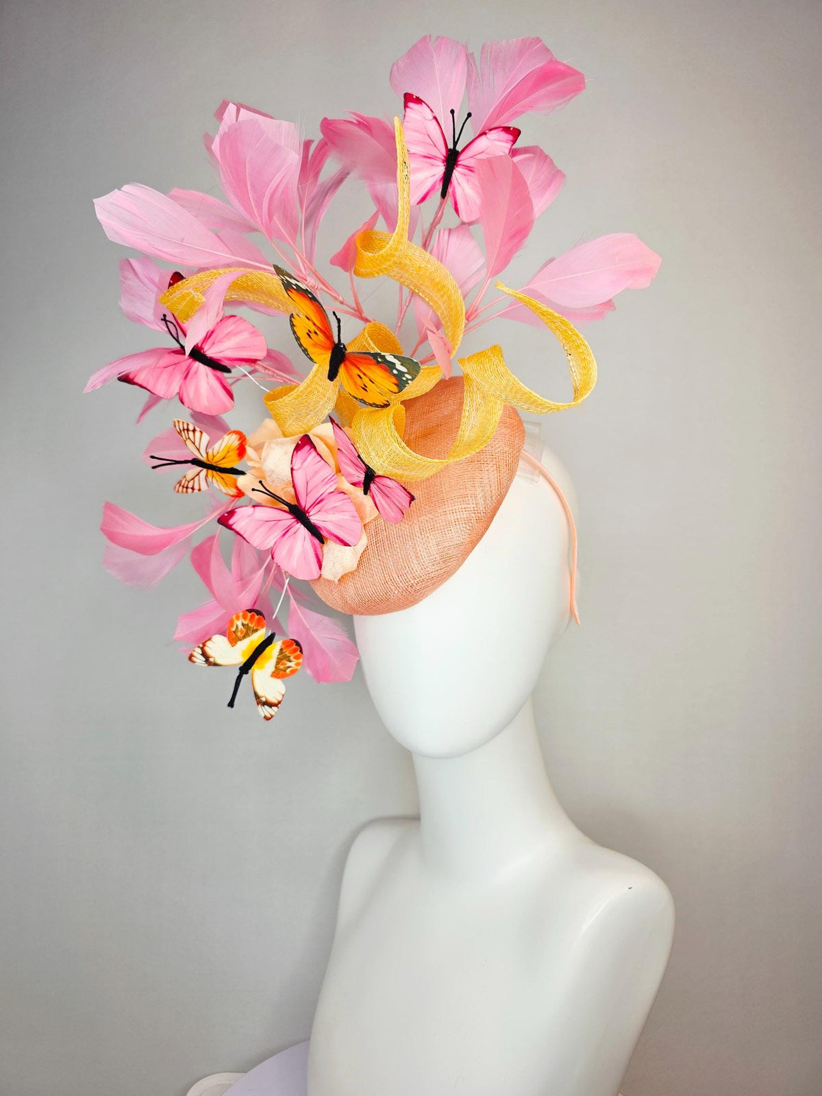 kentucky derby hat fascinator champagne sinamay yellow curls cream gold organza flower light pink feathers orange black pink butterflies