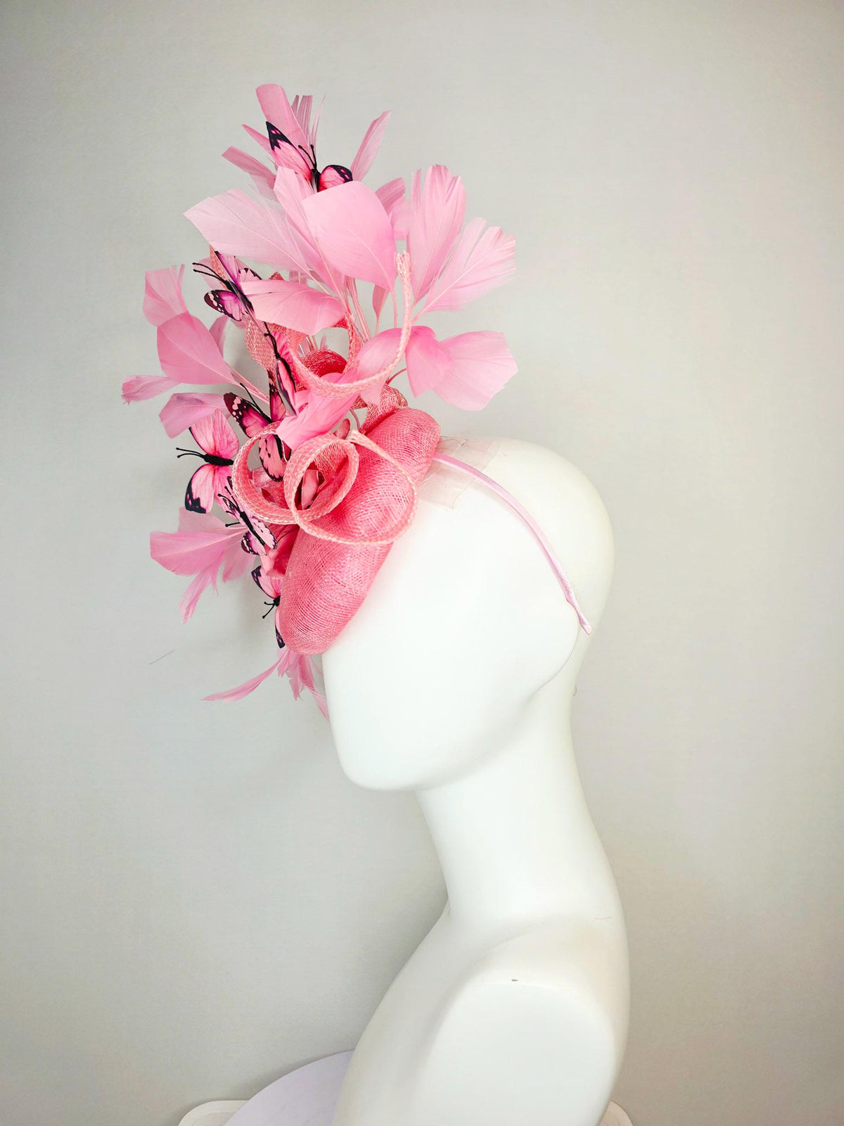 kentucky derby hat fascinator dusty pink sinamay with curls rose pink organza flower baby pink feathers light pink and black butterflies