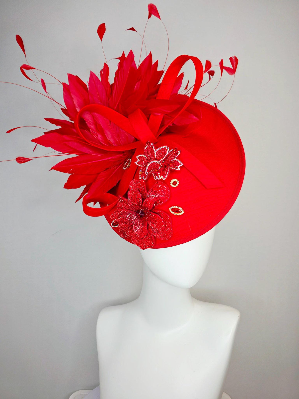 kentucky derby hat fascinator bright red shantung saucer with shantung bow red crystal rhinestone flowers scarlert red branching feathers