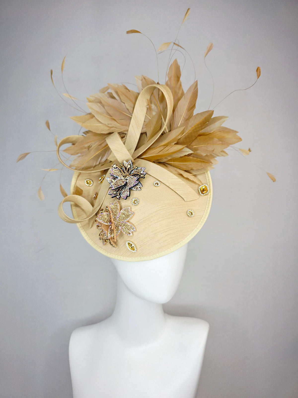 kentucky derby hat fascinator beige shantung saucer with shantung bow gold silver crystal rhinestone flowers tan beige gold feathers