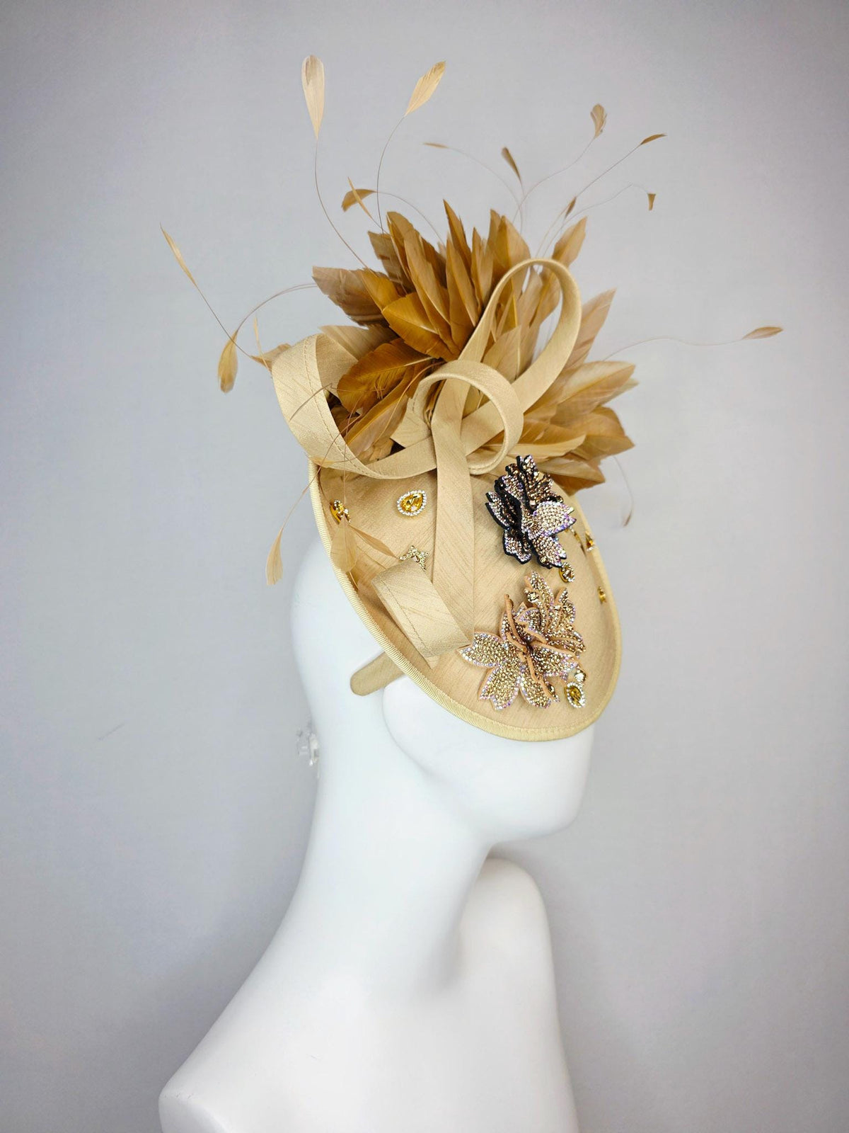kentucky derby hat fascinator beige shantung saucer with shantung bow gold silver crystal rhinestone flowers tan beige gold feathers
