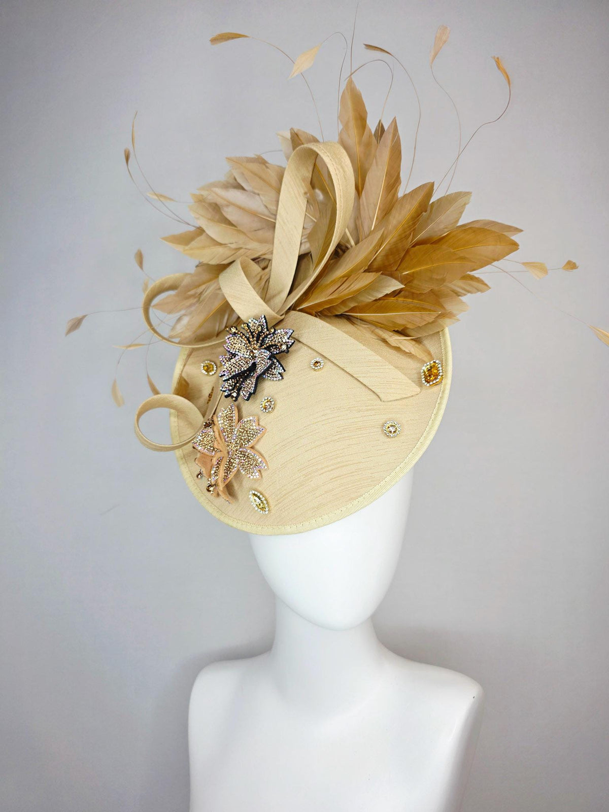 kentucky derby hat fascinator beige shantung saucer with shantung bow gold silver crystal rhinestone flowers tan beige gold feathers