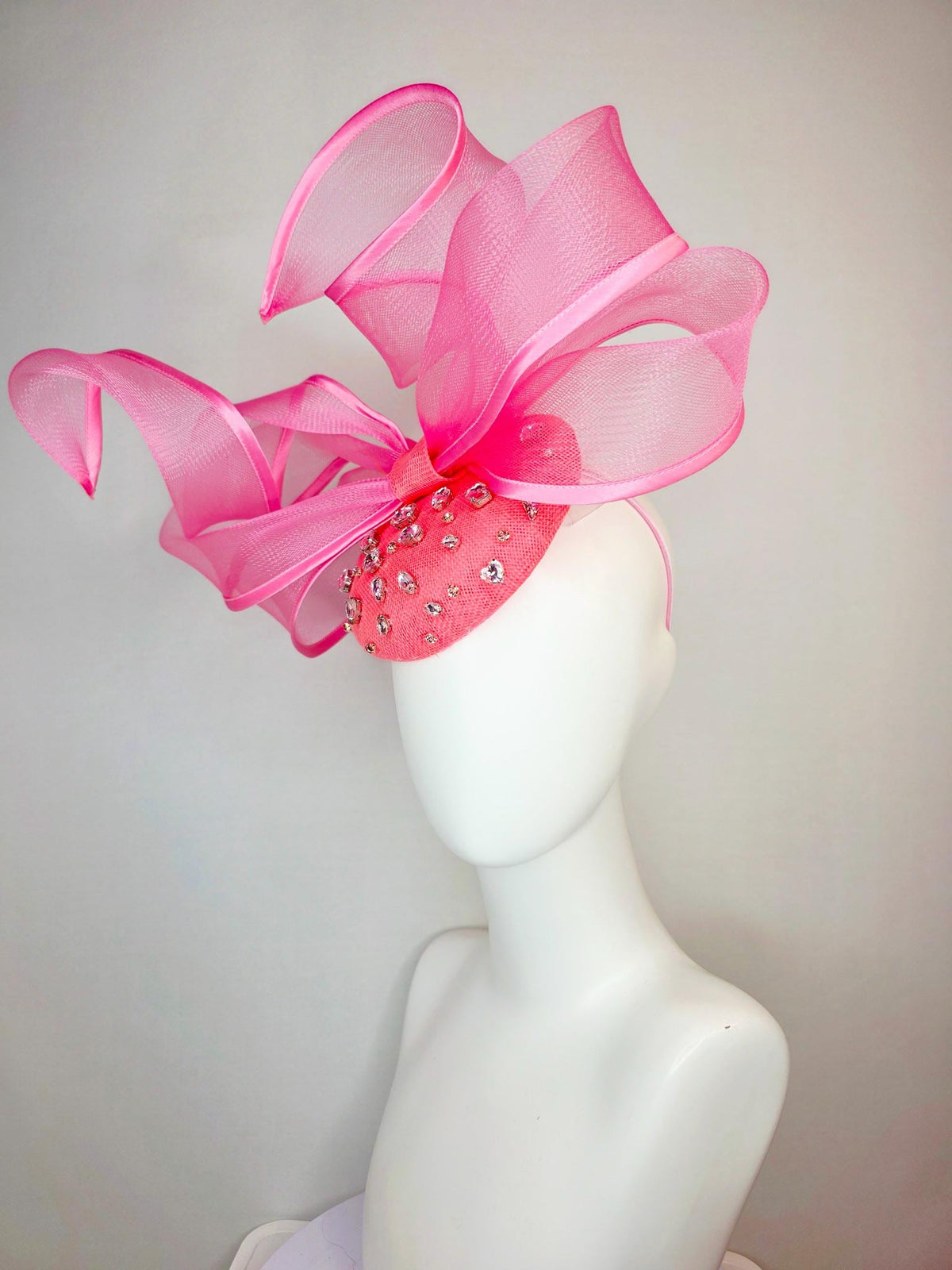kentucky derby hat fascinator raspberry pink sinamay base with clear crystal jewels blush pink mesh wired ribbon large bendable bow decor