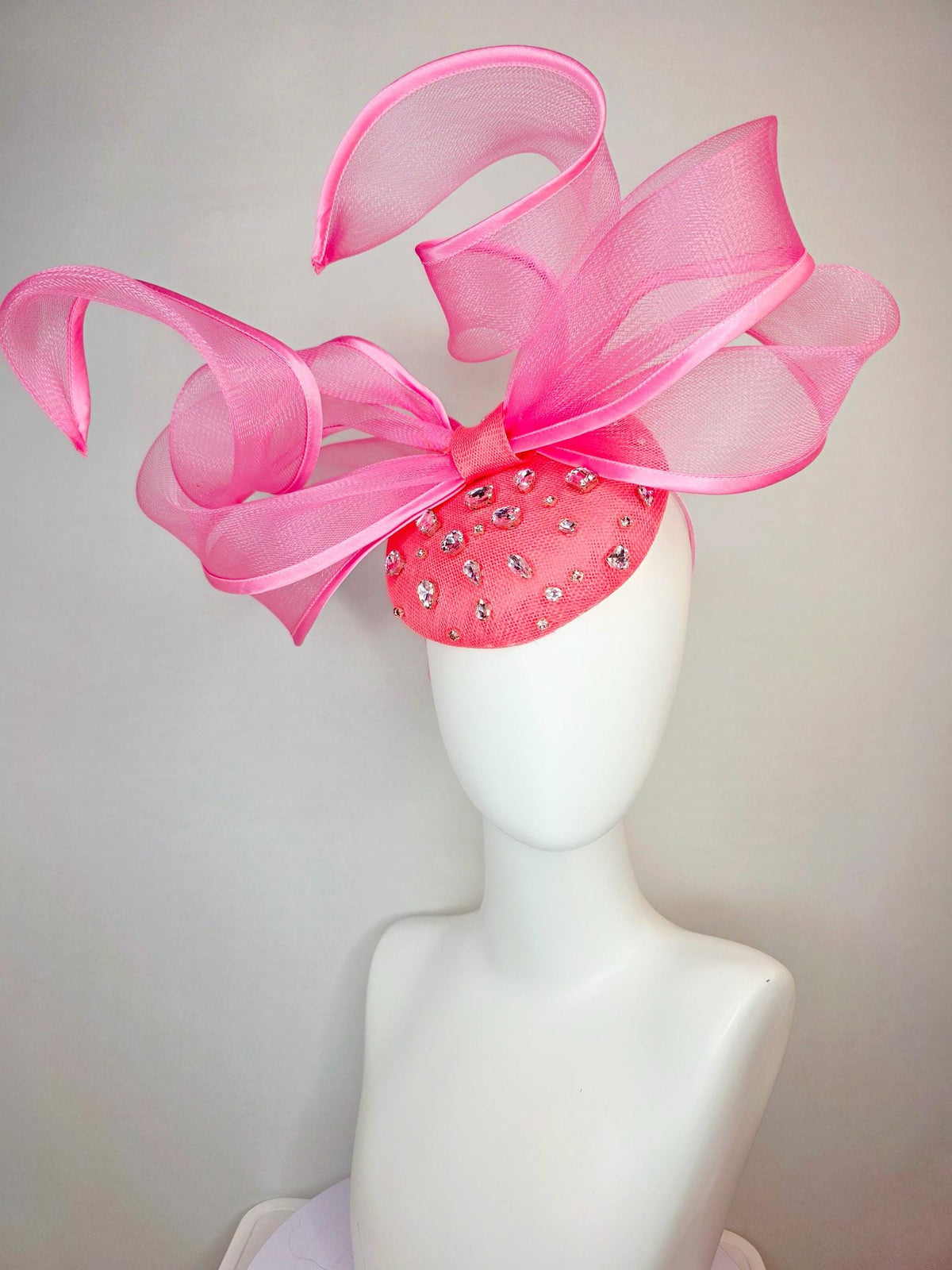 kentucky derby hat fascinator raspberry pink sinamay base with clear crystal jewels blush pink mesh wired ribbon large bendable bow decor
