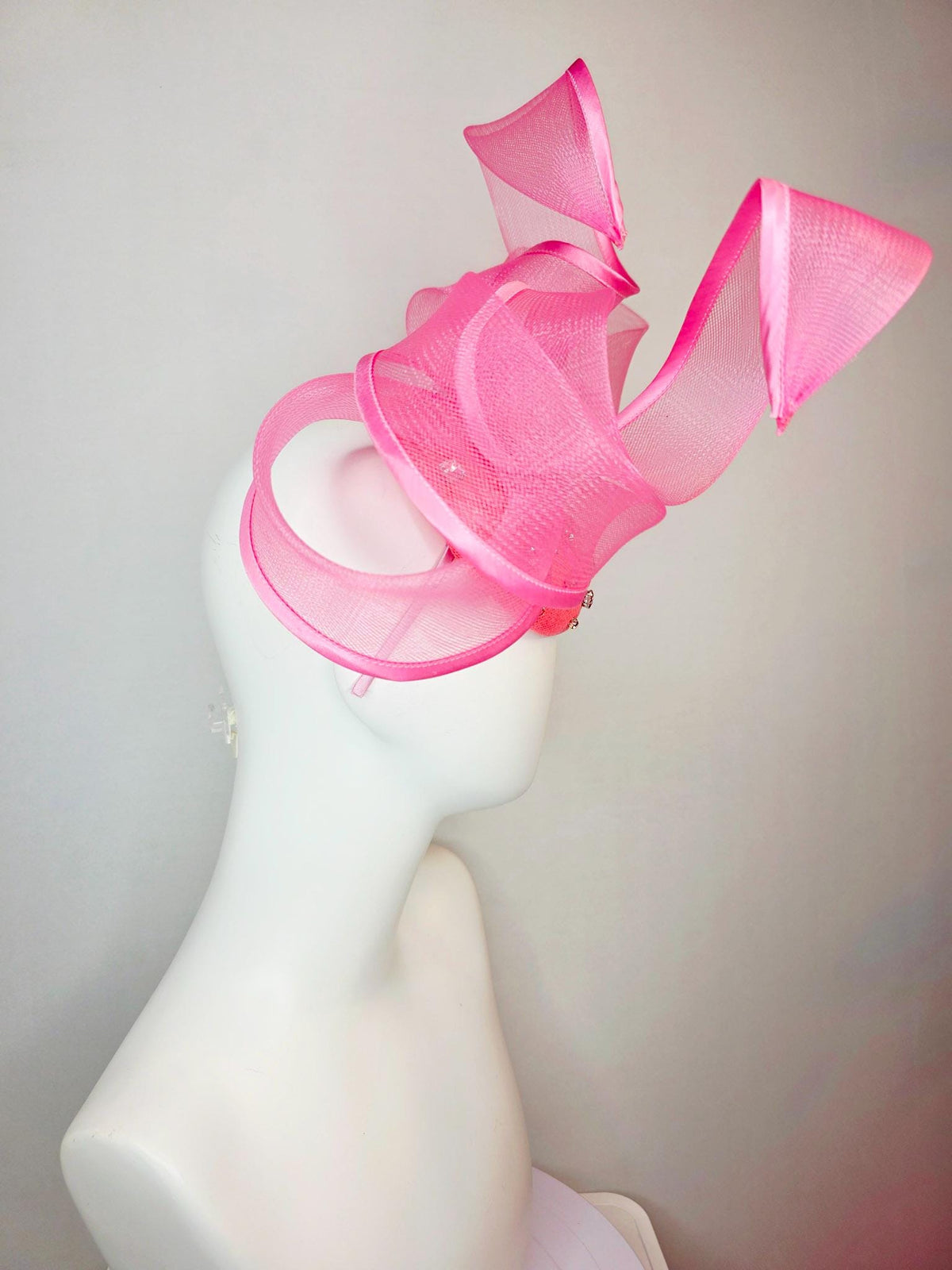 kentucky derby hat fascinator raspberry pink sinamay base with clear crystal jewels blush pink mesh wired ribbon large bendable bow decor