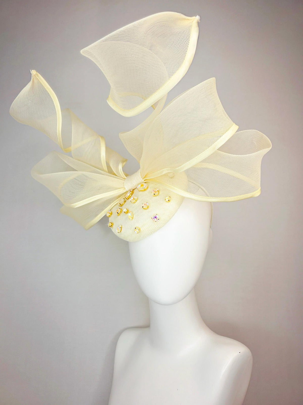 kentucky derby hat fascinator light yellow sinamay base with iridescent yellow crystal jewels mesh wired ribbon large bendable bow decor