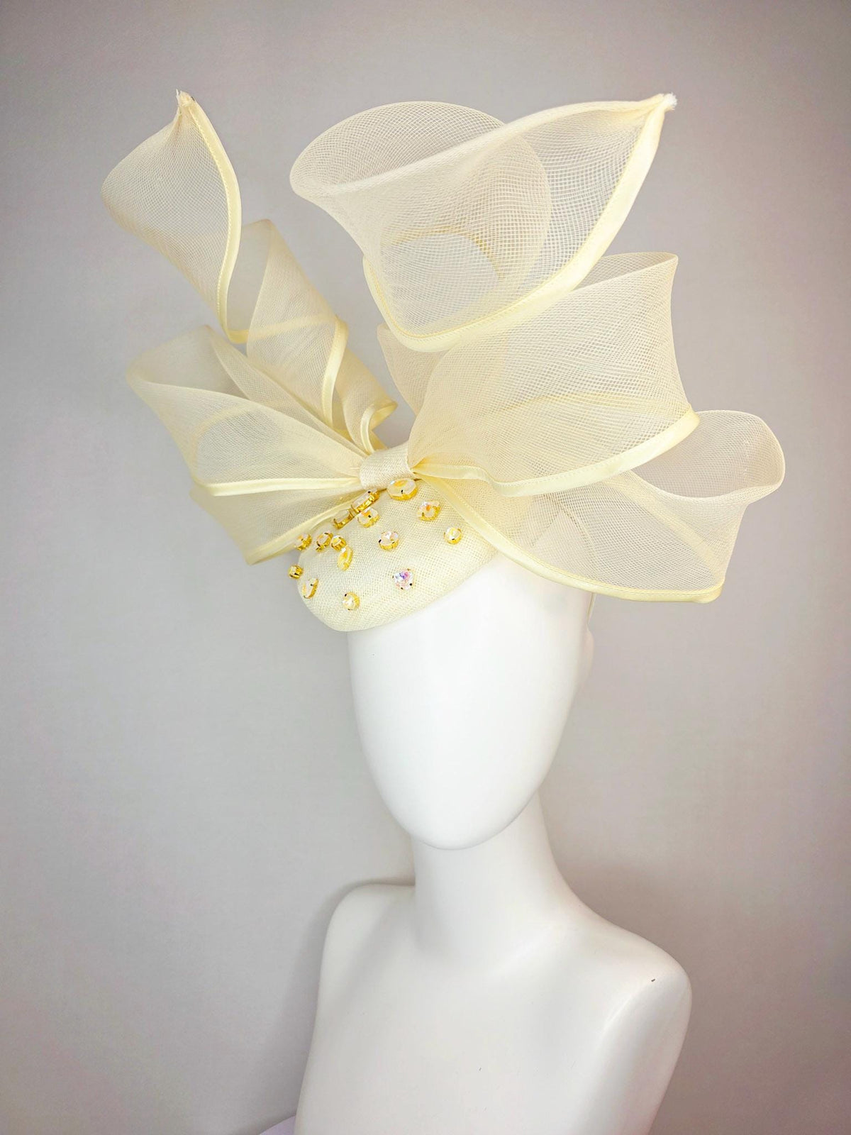 kentucky derby hat fascinator light yellow sinamay base with iridescent yellow crystal jewels mesh wired ribbon large bendable bow decor