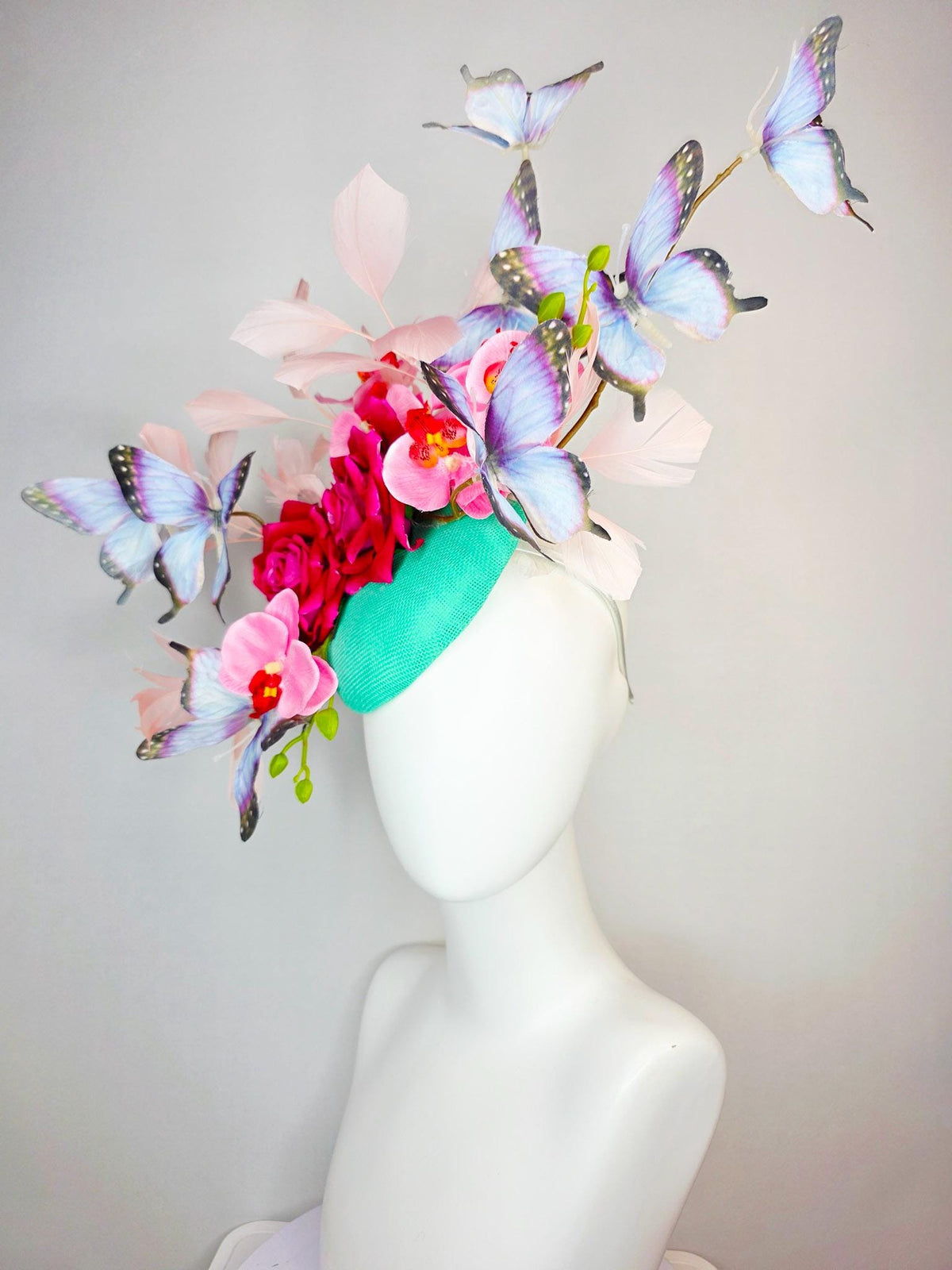kentucky derby hat fascinator mint green sinamay red roses pink orchids pale light pink branching feathers black lavender purple butterflies